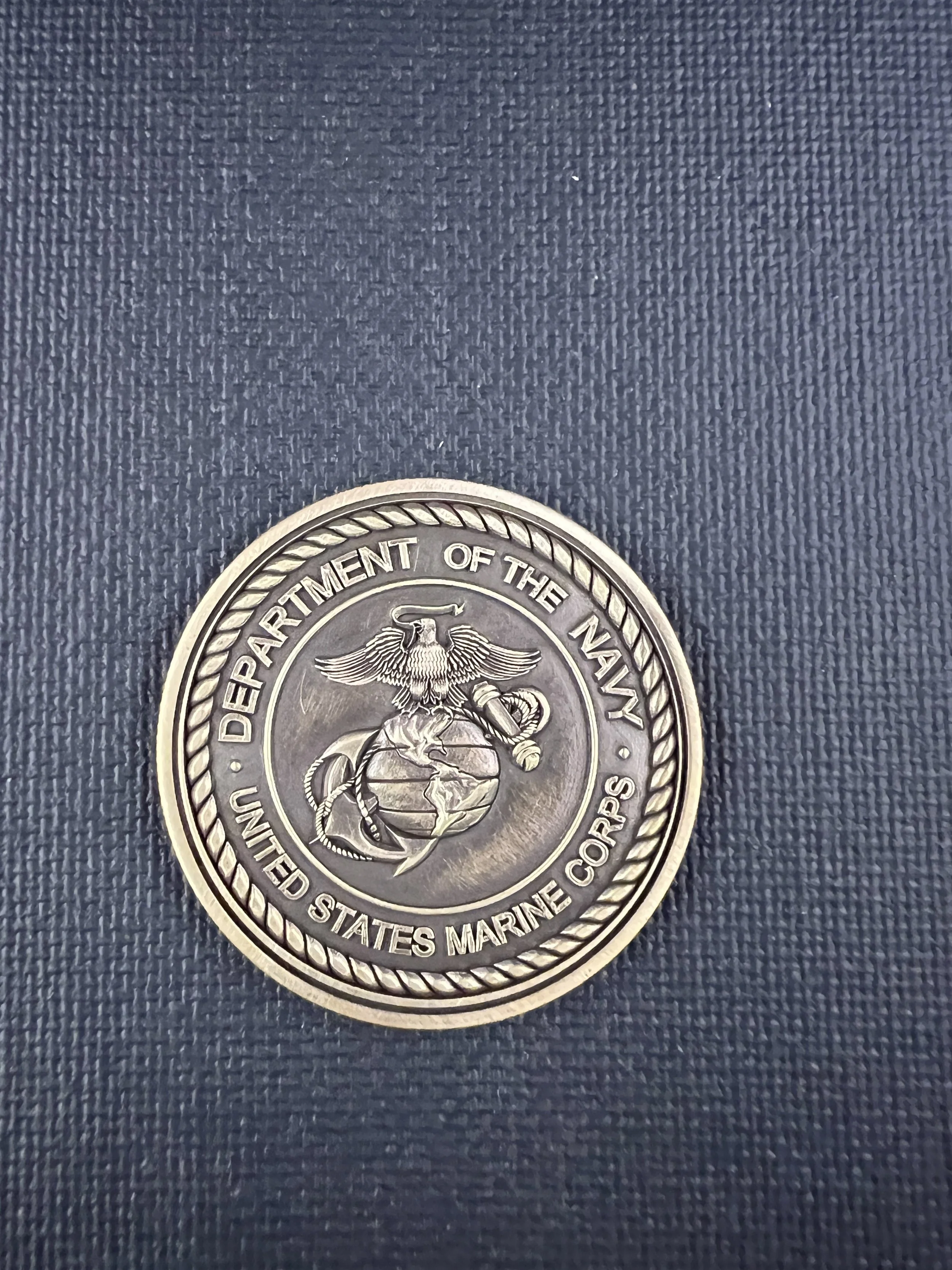 3D engraved military challenge coin featuring United States Marine Corps emblem, crafted in brass or stainless steel with detailed raised relief engraving.