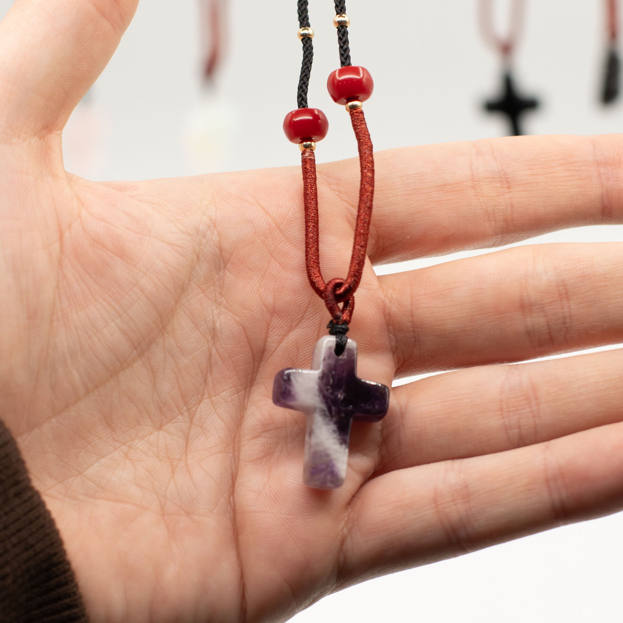 Amethyst Cross gemstone cord necklace.jpeg