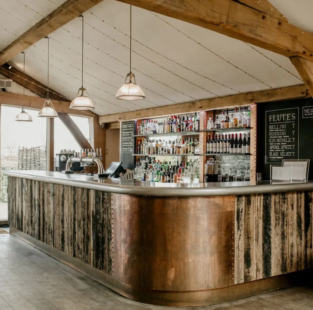 Copper and larch clad bar for Cripps wedding Barn.