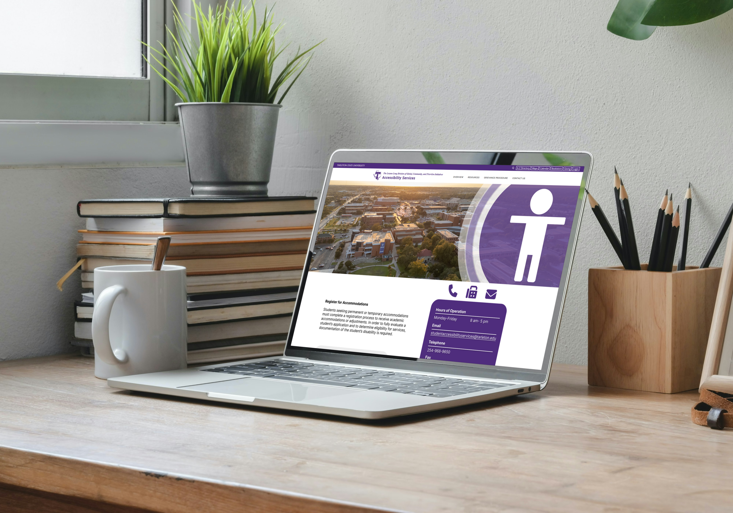 A computer with a purple home screen mockup.