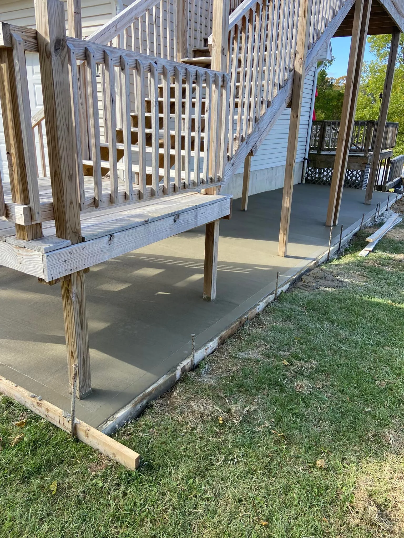 Concrete under lifted decking