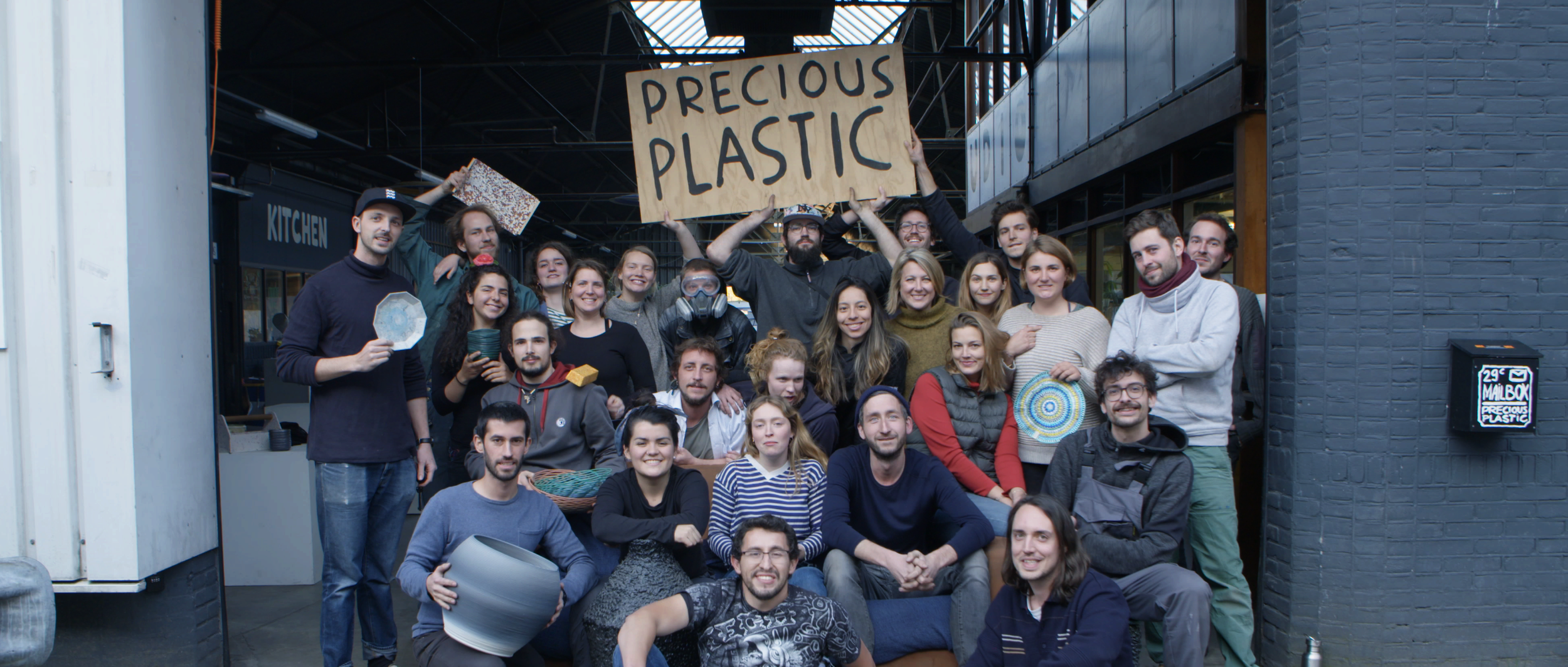 Group pictures from the Version 4 volunteers for Precious Plastic.