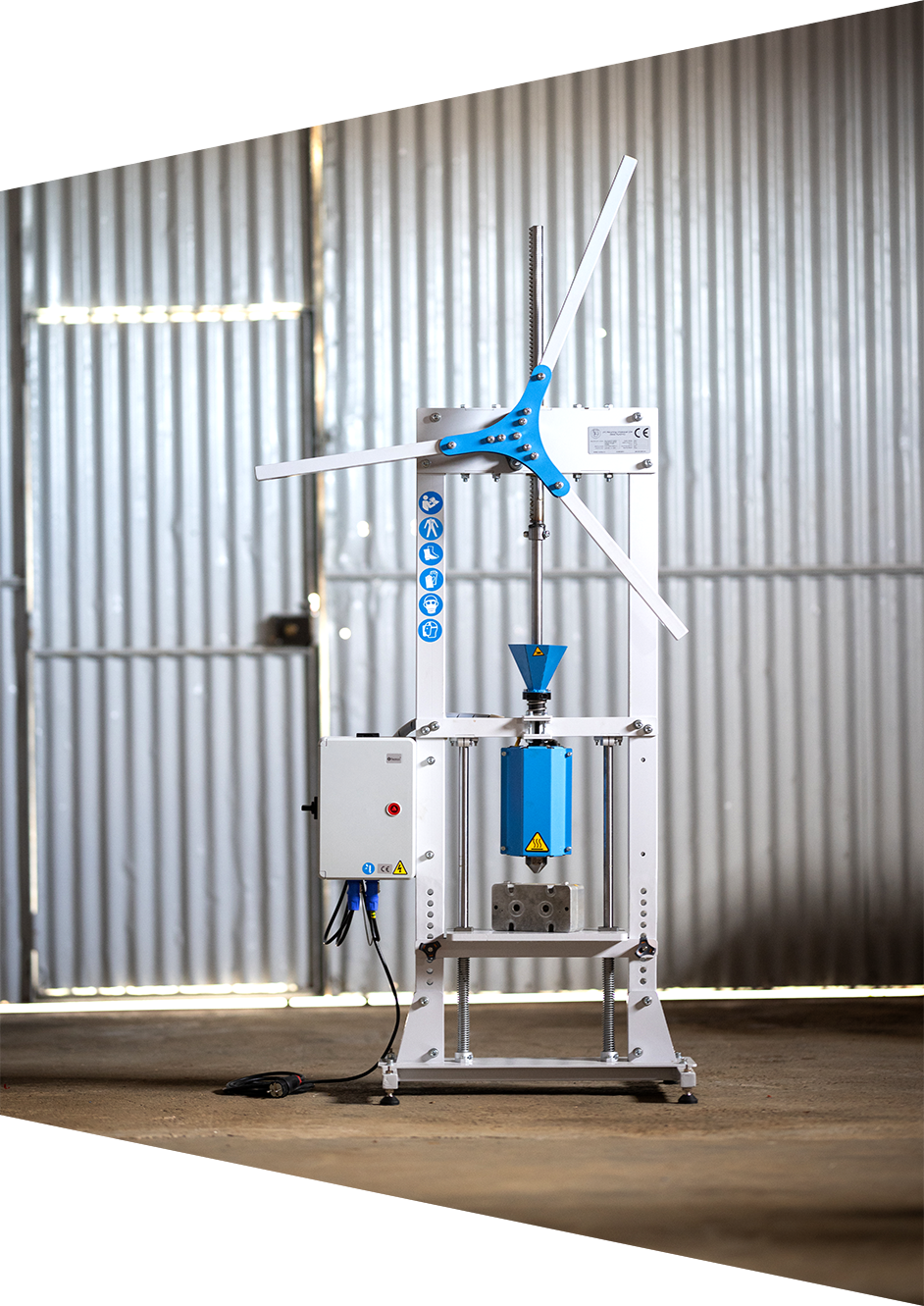 Picture of the Arbor Injection Machine, a machine which can inject molten recycled plastic into molds. Designed and produced by Mad Plastic.