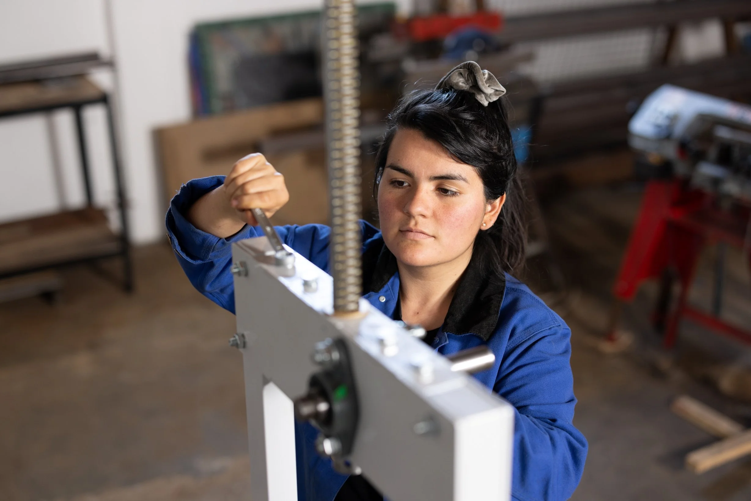 Caro assembling the Injection machine. 