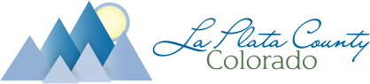 Stylized logo of mountains, sun, and a cloud with the text 'Alaska Tourism'.