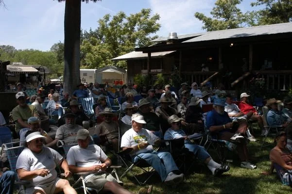 Old photo of the audience seated at the Parkfield Bluegrass Festival