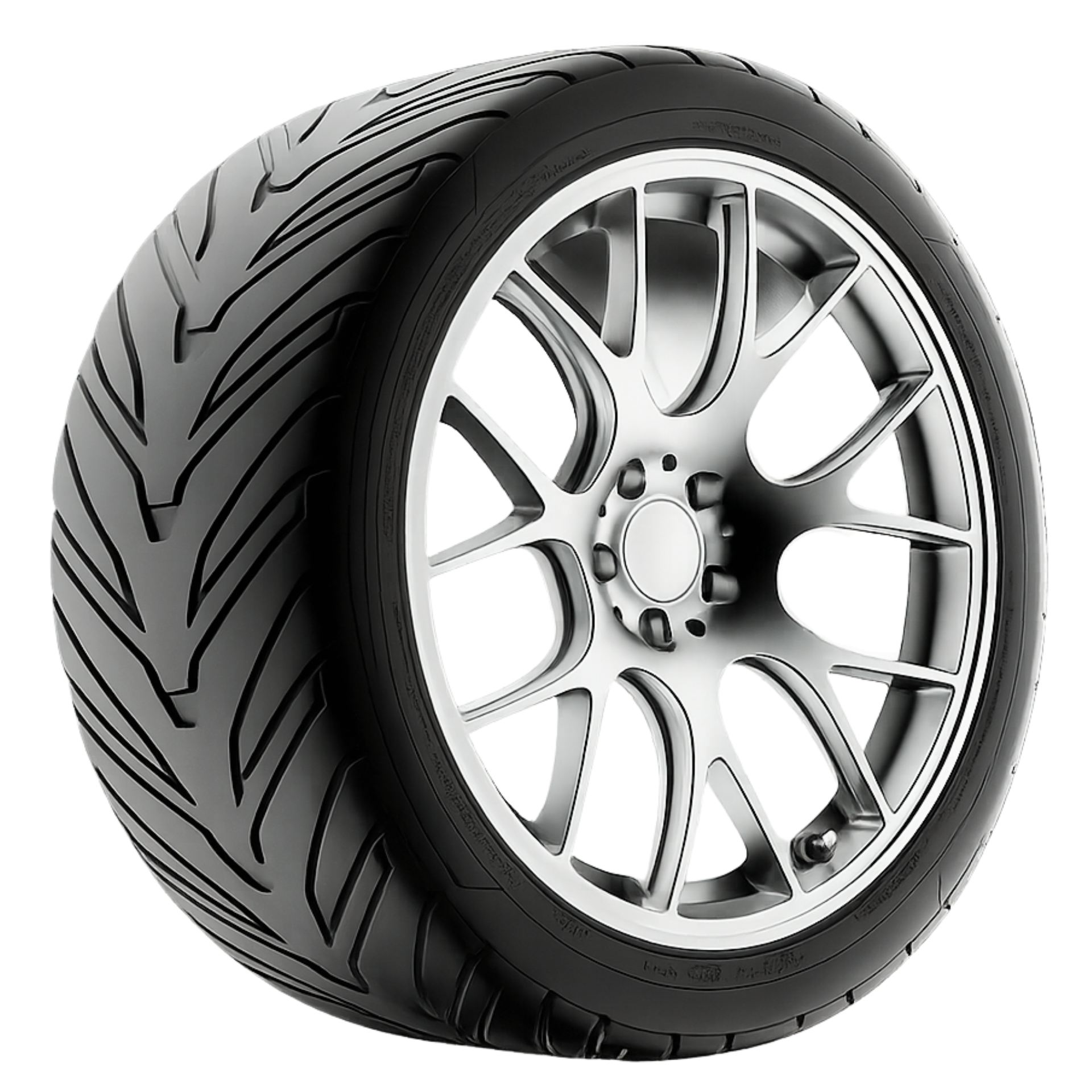 A car tire with an alloy wheel, showing the tread pattern on the rubber and the silver wheel rim.