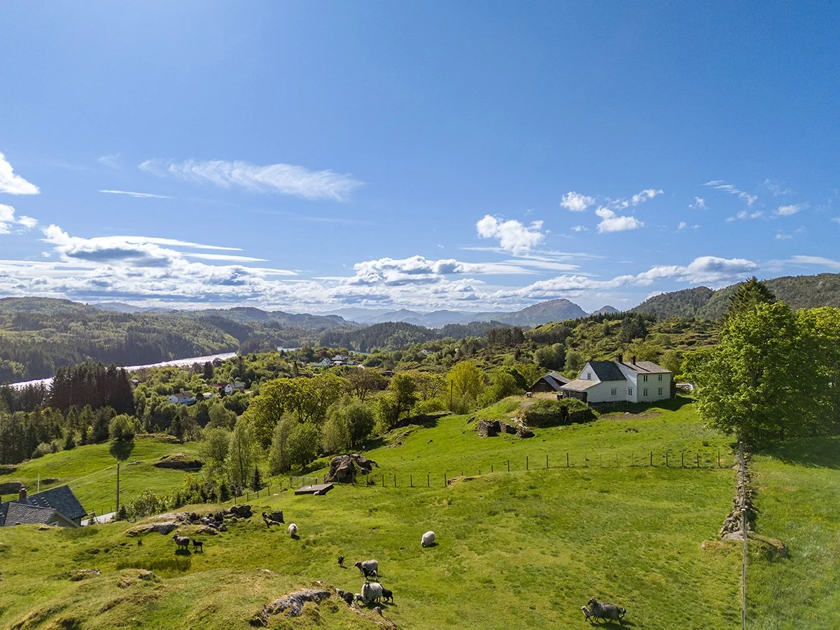 Kartveit Guesthouse seen from the hill behind the house