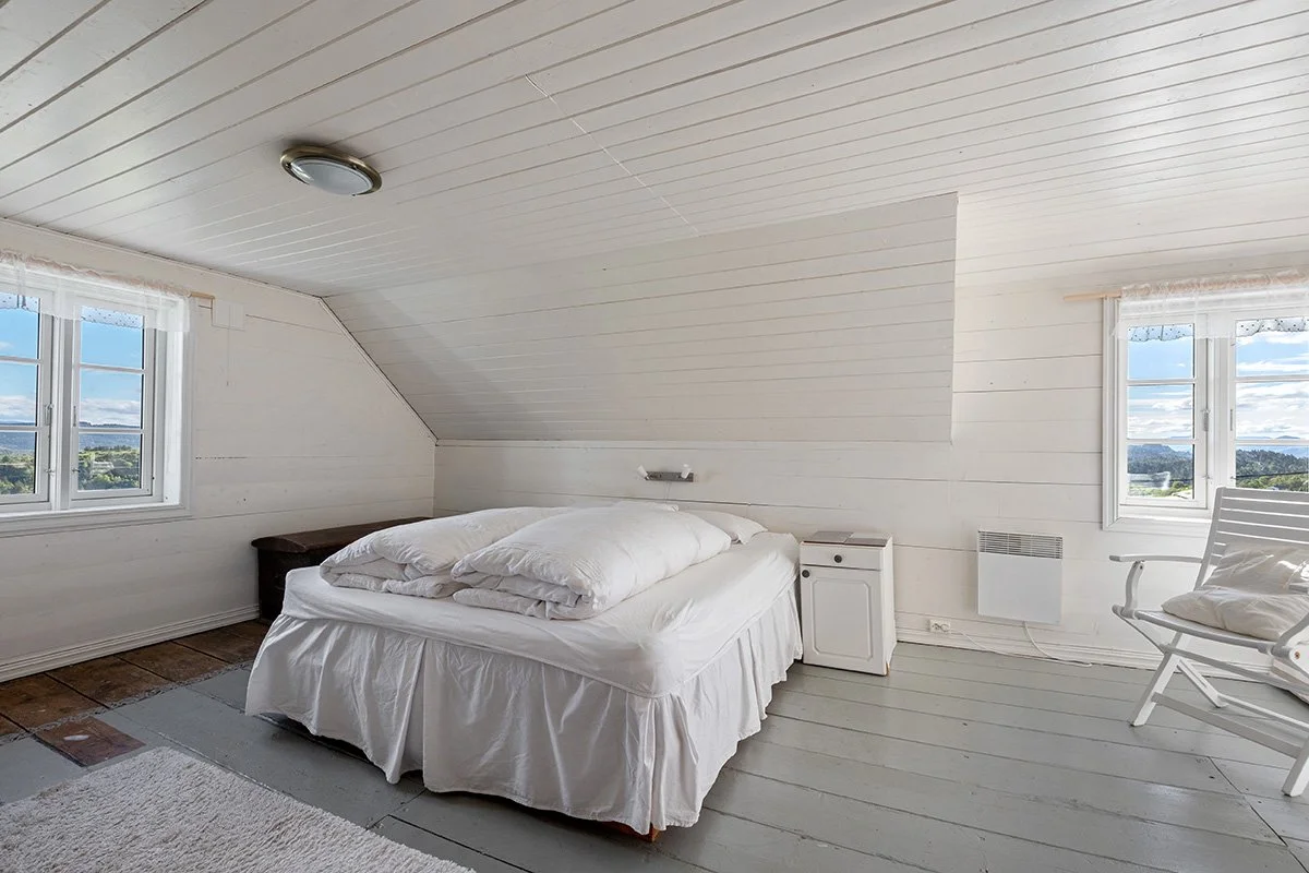 The largest bedroom, including a double bed and a children's bed