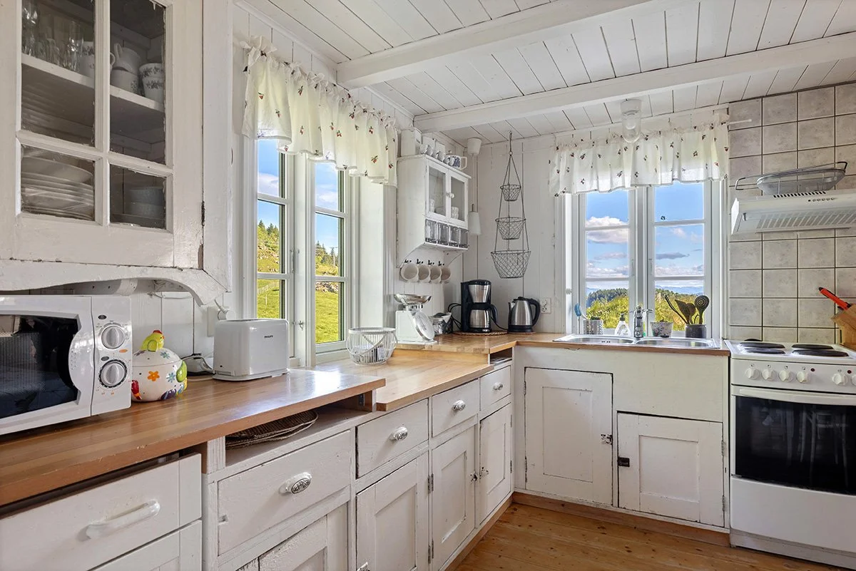 The view from the kitchen often includes the local sheep