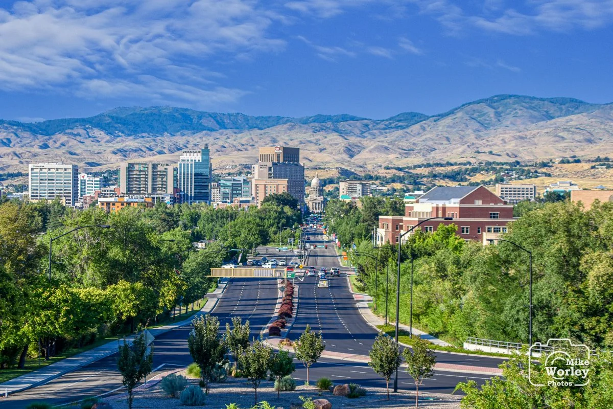 Downtown Boise Idaho from the 1927 train station. The street is Capital Blvd and it is anchored by the depot and the Idaho State Capitol Building, visible at the back center