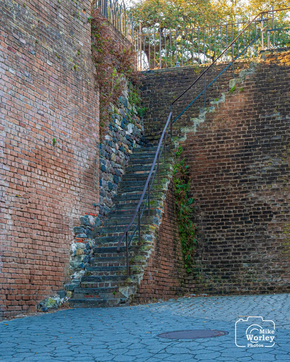 Stairs leading from River Street to the 'high street' - Main. Built before standards were in place, the steps are different heights from each other.