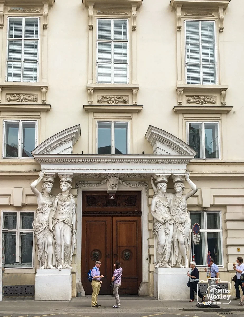 Classical statuary adorns many buildings in Vienna