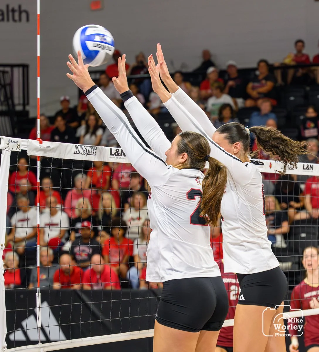 Payton Petersen (21) and Cara Cresse for the block