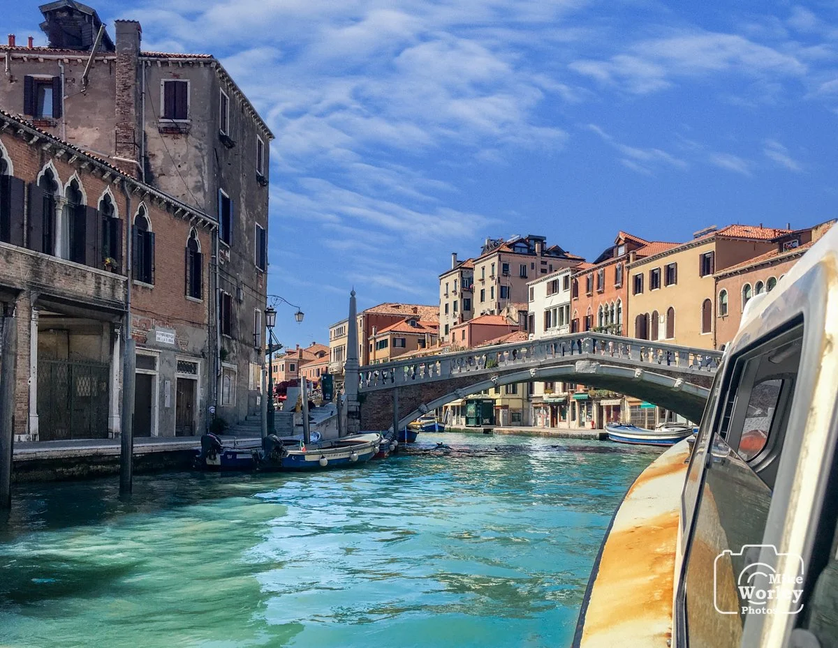 On a water taxi approaching the Ponte della Guglie bridge in Venice