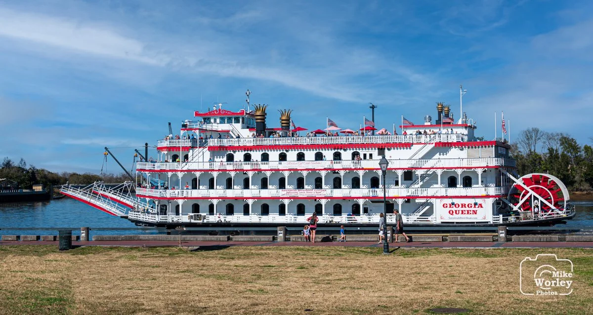 Sternwheeler Georgia Queen passing the Olympic Cauldron on the Savannah River