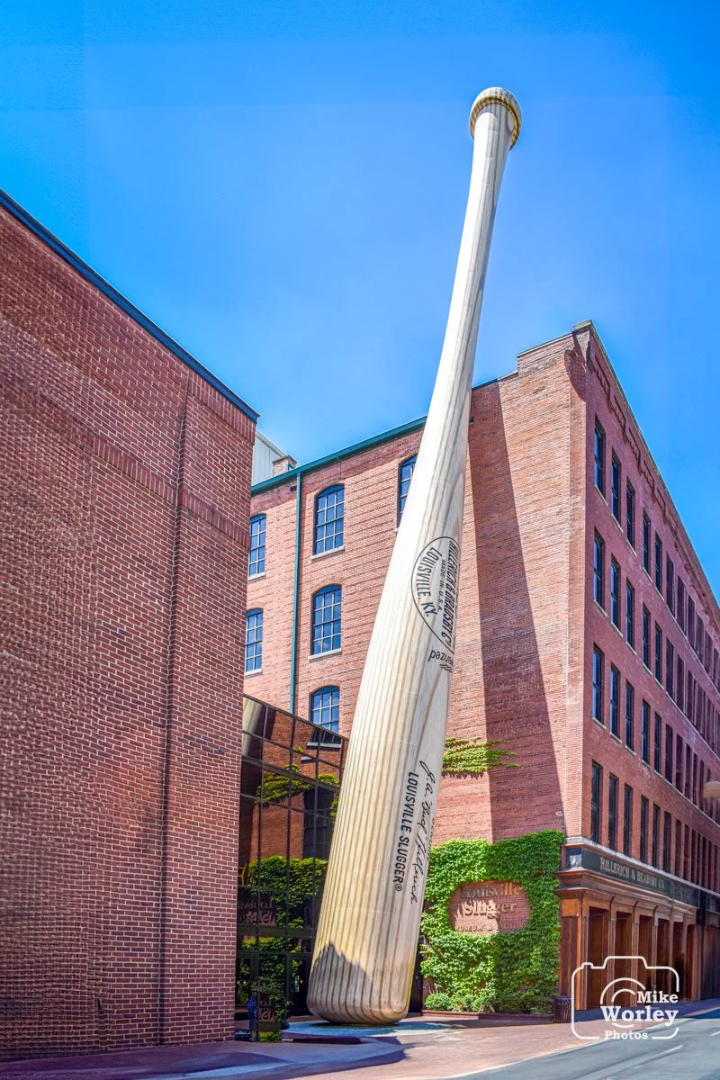 The Louisville Slugger Factory and Museum in downtown Louisville. All Louisville Slugger wooden bats are made in this facility, with many custom designs requested by Major League Baseball players. The museum holds artifacts from the history of the ga