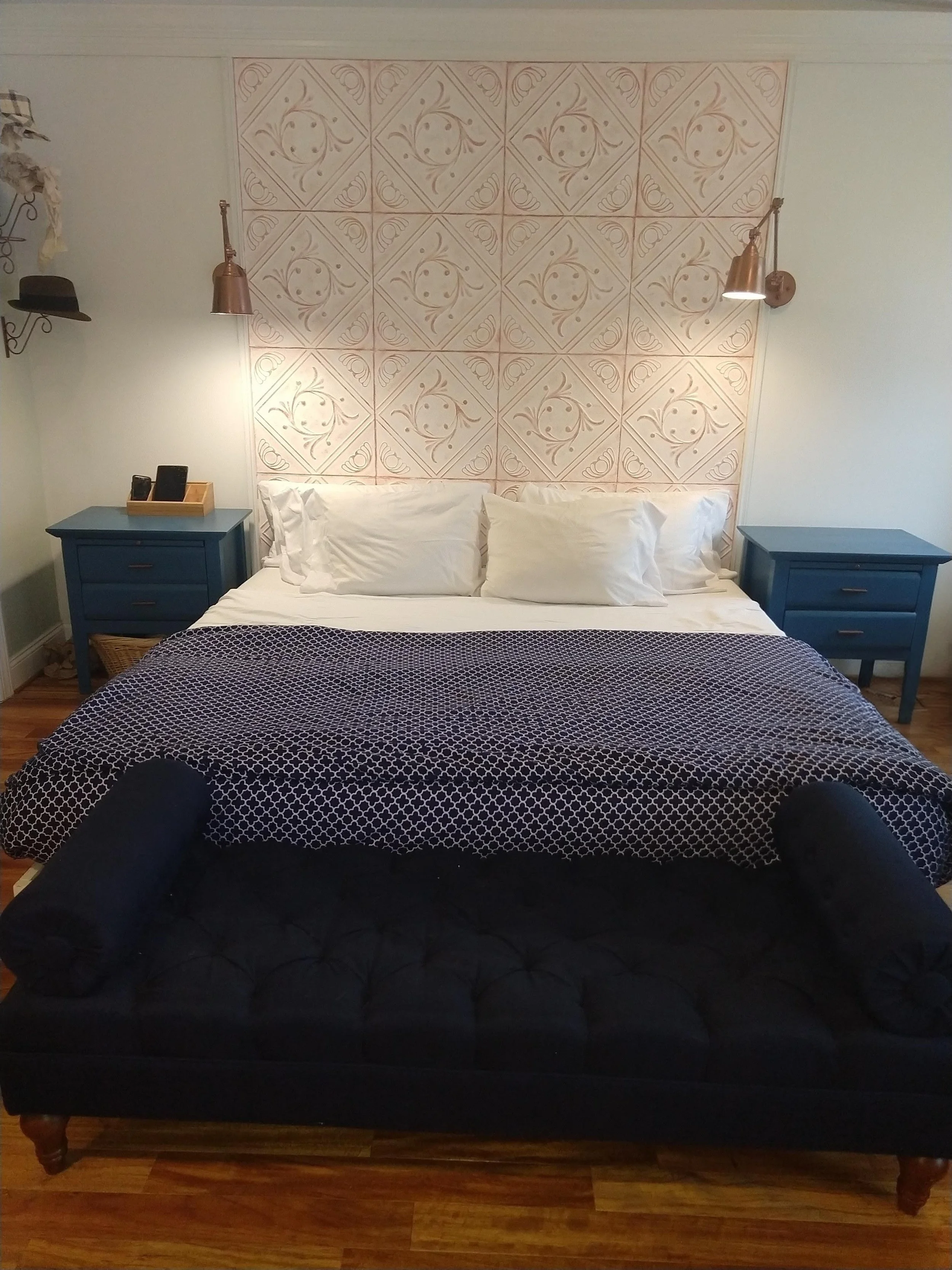 The wall sconces provide soft lighting in the evening to promote rest and relaxation.