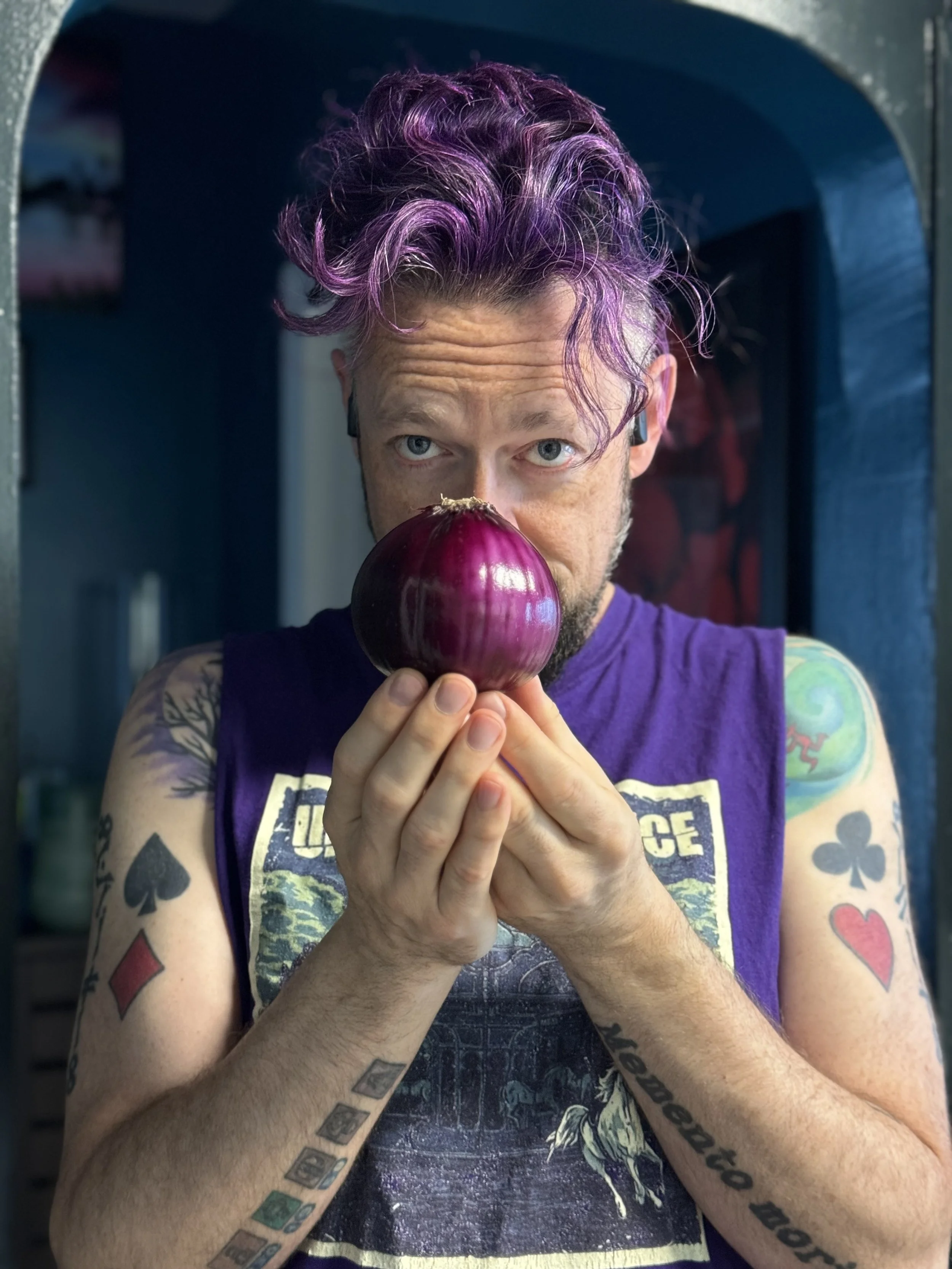 A candid portrait of Sasha, a Portland Oregon wedding officiant, reflecting on love, marriage, and the art of writing meaningful wedding vows.