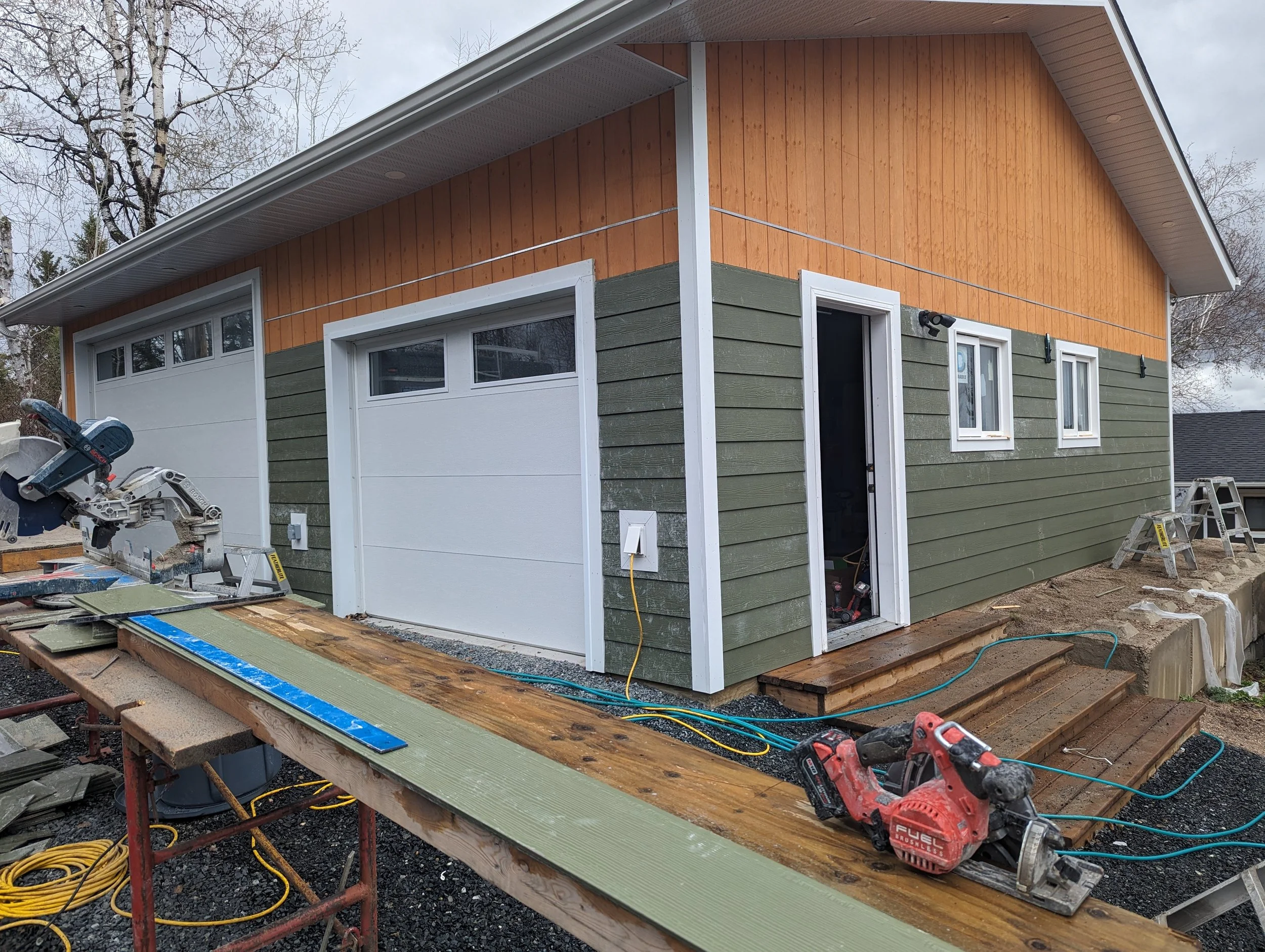 Siding install and Window replacement done 2024