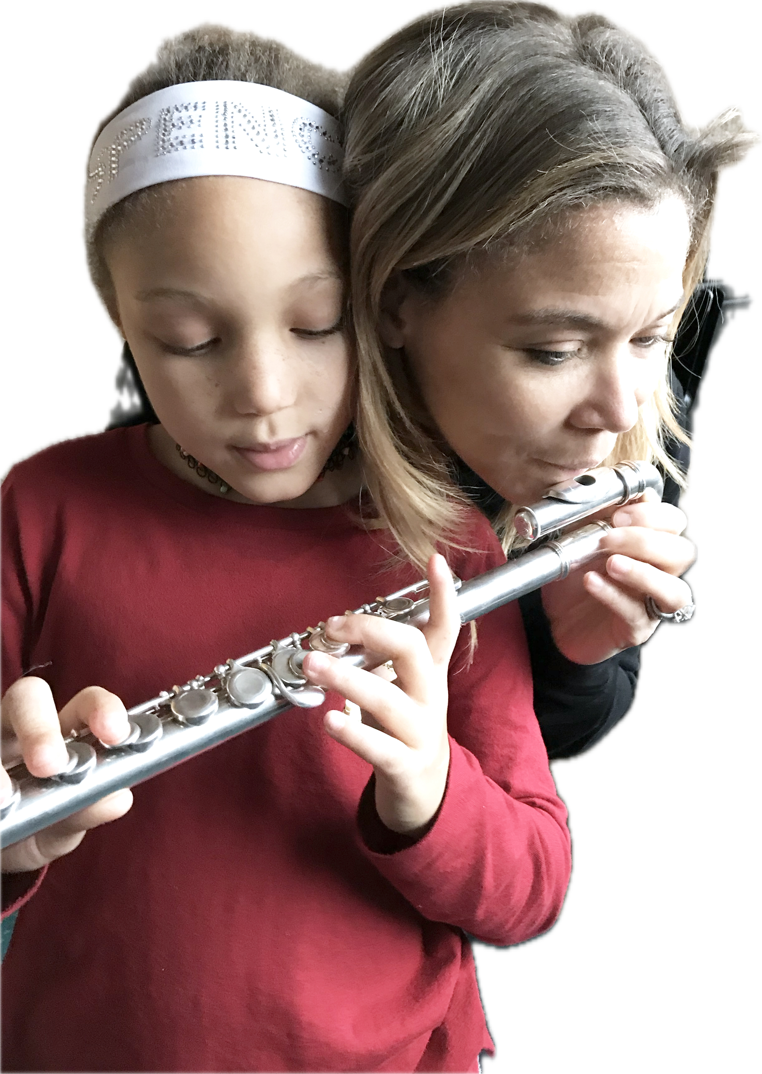 Wendy's Suzuki flute student holding the curved headjoint flute while her mother plays the headjoint