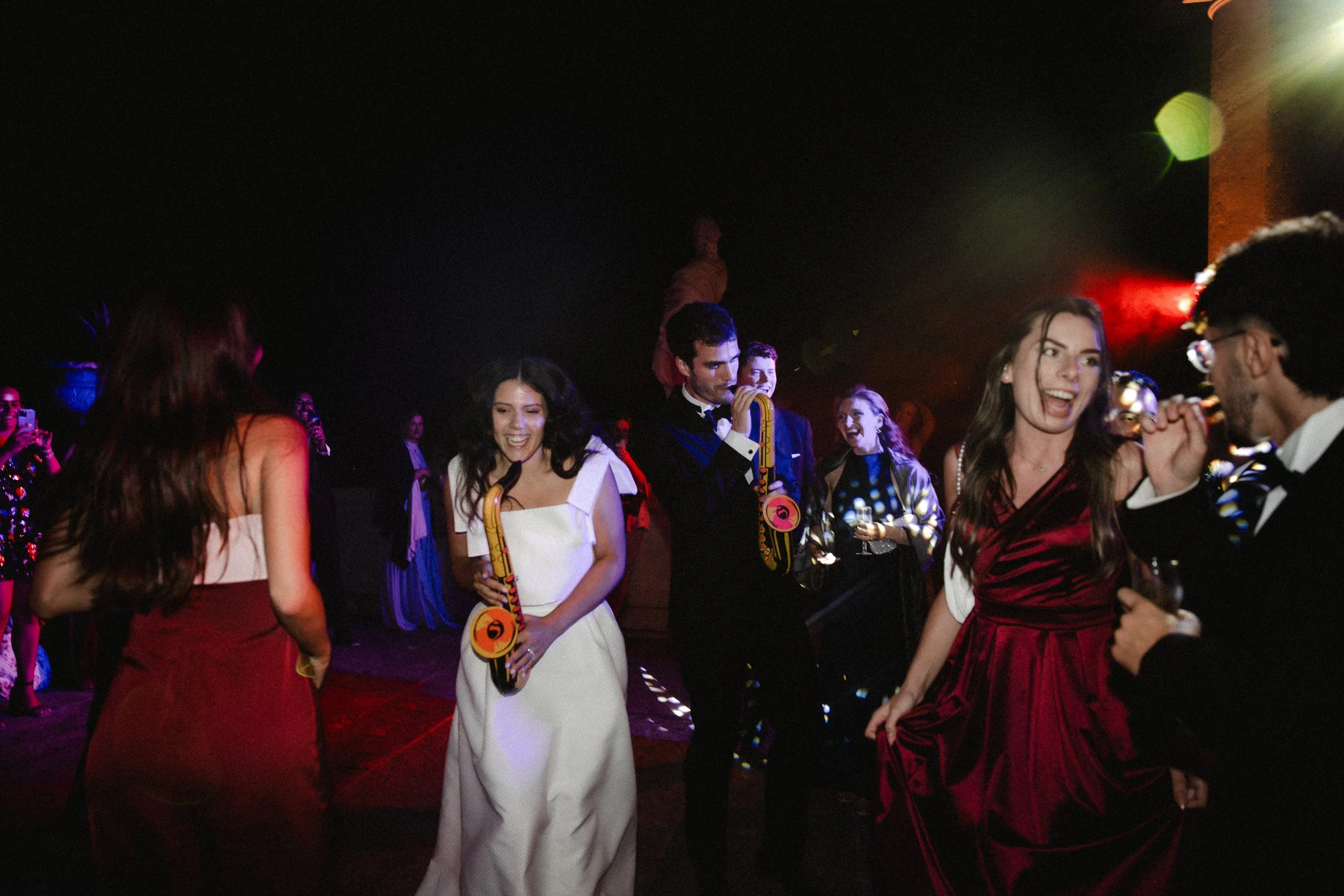  Guests dancing and celebrating at Michael &amp; Amandine’s wedding party in the Palace of Queluz 