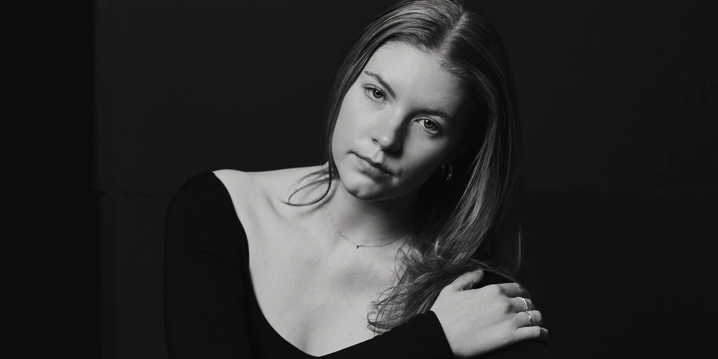 elegant portrait of a women dancer. soft beautiful lighting. black and white. actor and dancer headshots nyc. commercial