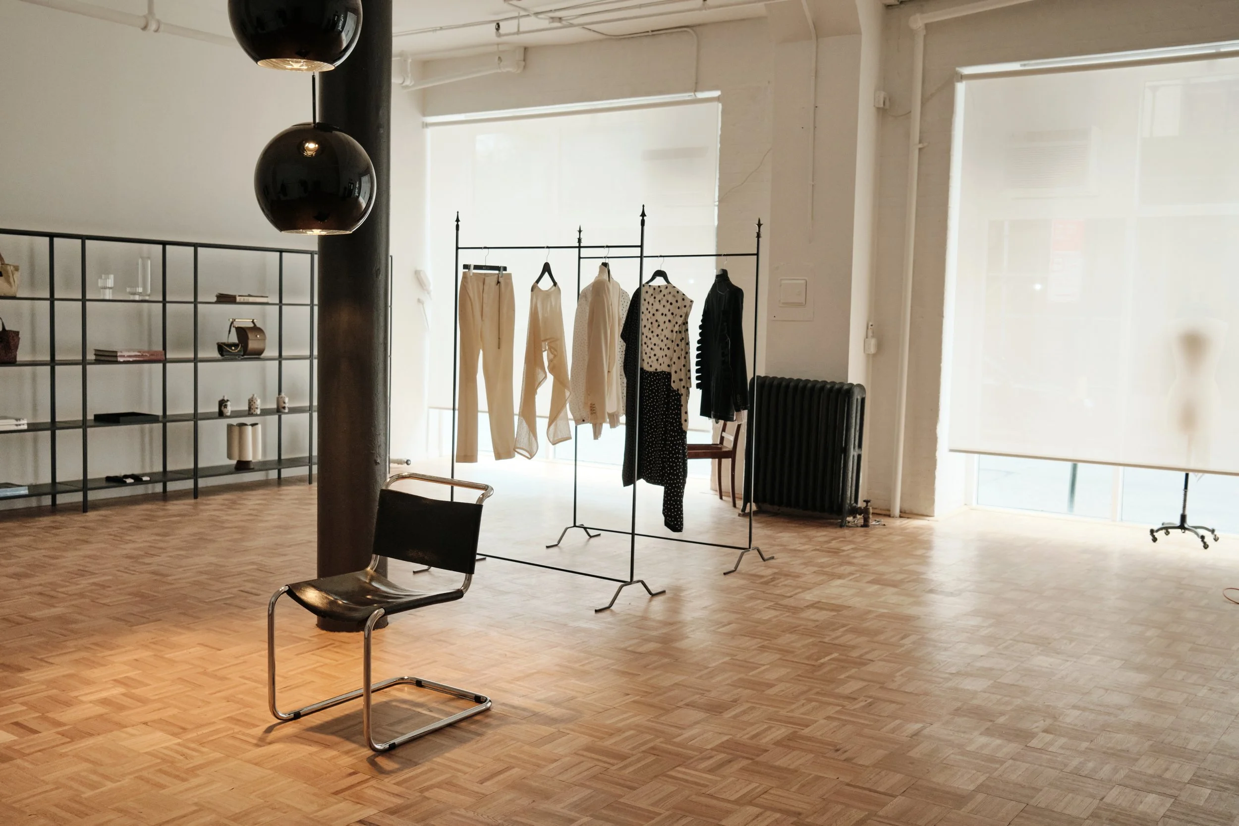 wide shot of a tribeca loft. retail design. classic chic interior with high fashion and interior objects. high design. architectural photographer.