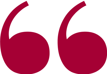 Large maroon quotation marks on a plain black background.