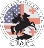 Emblem of the Georgia Association in U.S., featuring a black knight on horseback holding a sword, with American and Georgian flags in the background.
