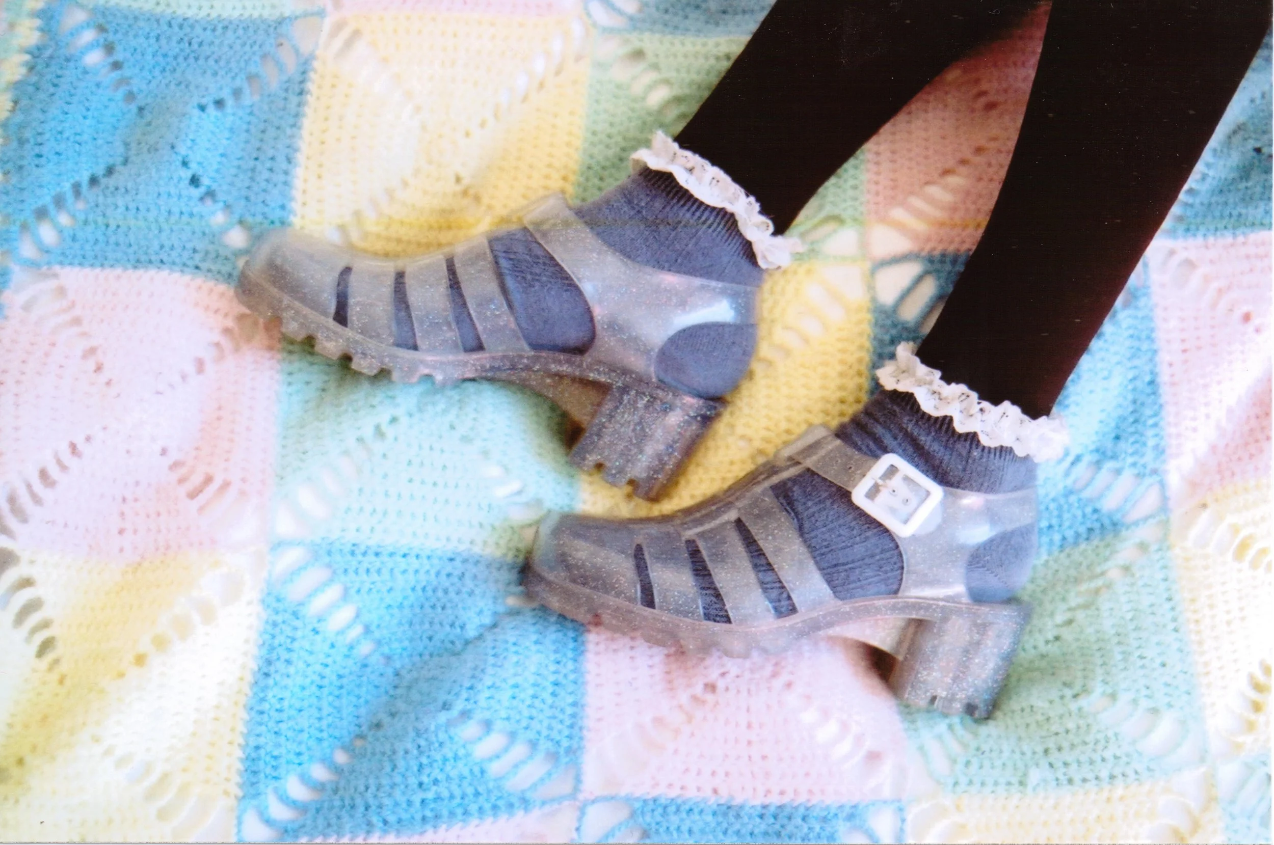 jelly-shoes-on-crocheted-quilt-90s-nostalgia-35mm-film-fashion-detail.jpg.jpg