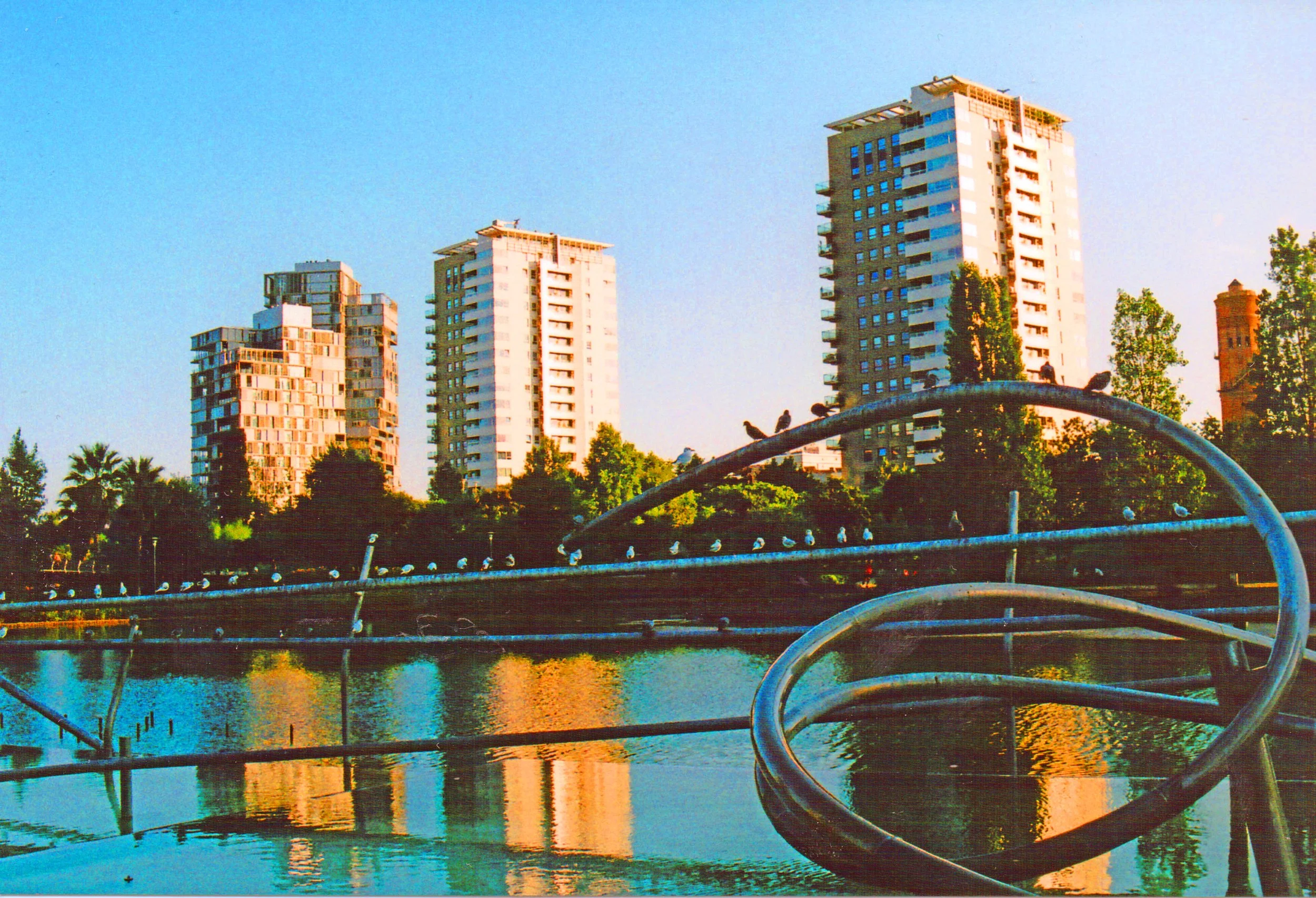 barcelona-spain-sunset-highrises-reflection-metal-sculpture-lake.jpg.jpg