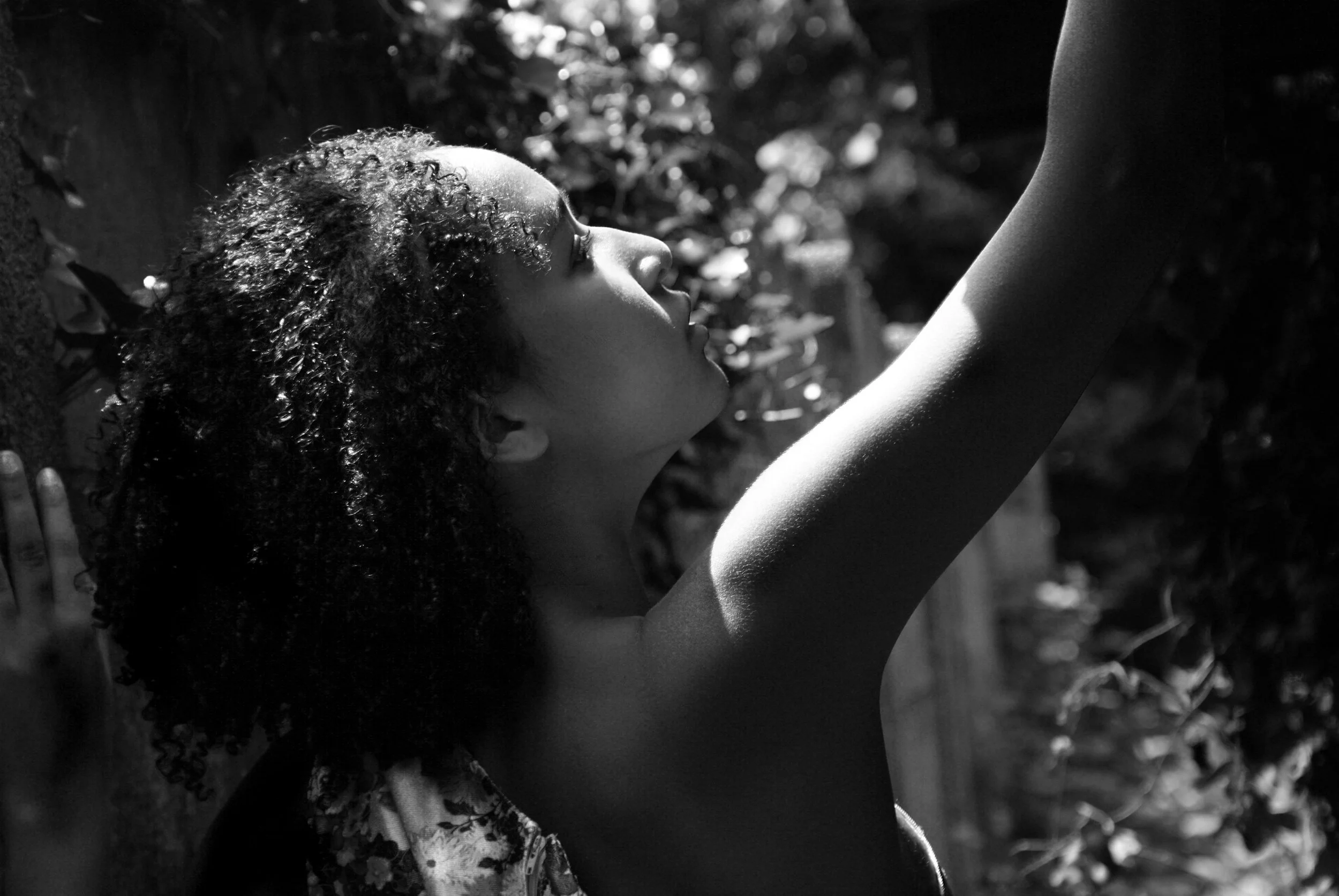 black-and-white-sunlit-portrait-curly-hair-editorial.jpg.jpg