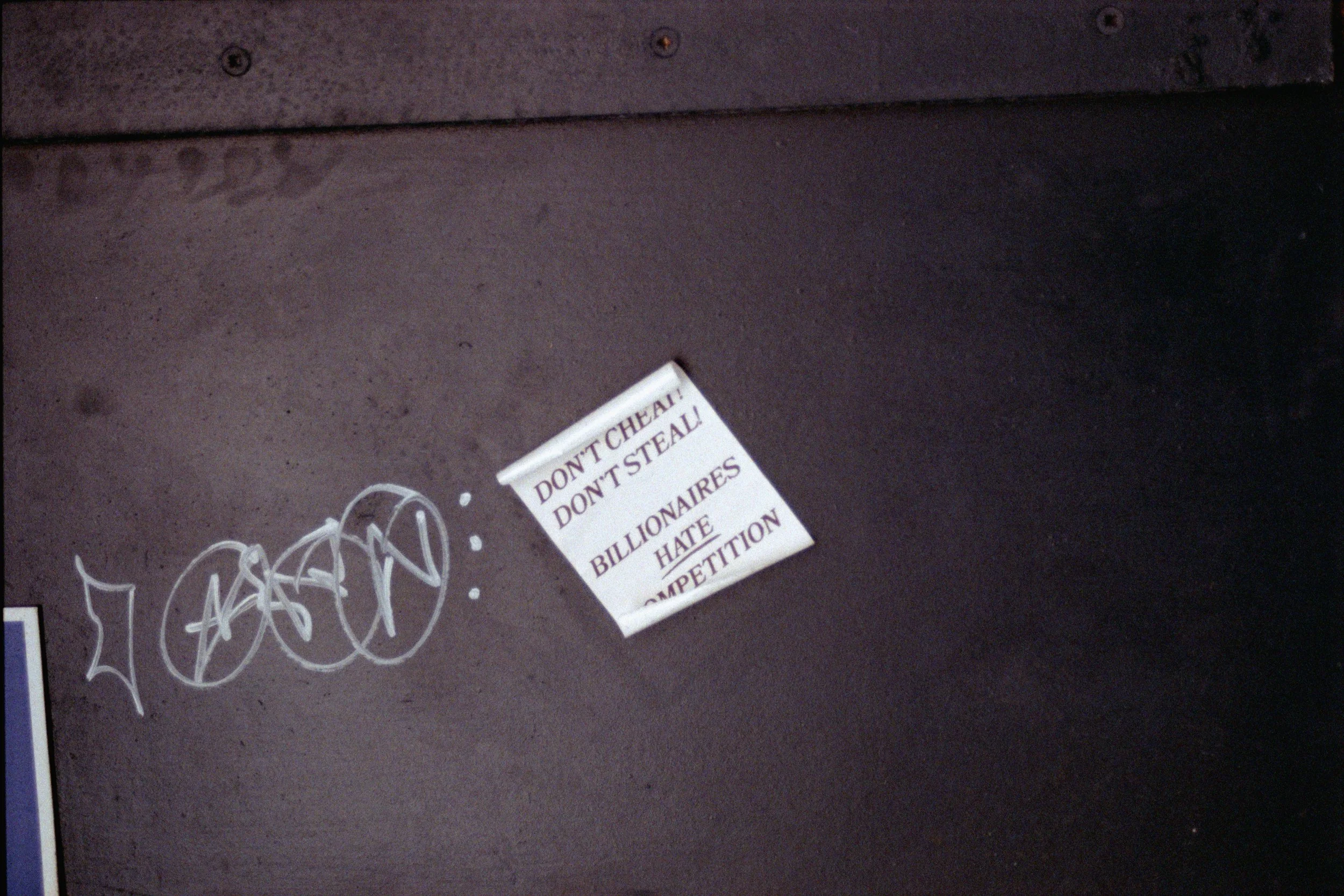dont-cheat-dont-steal-billionaires-hate-competition-sticker-street-photography-35mm-film.jpg