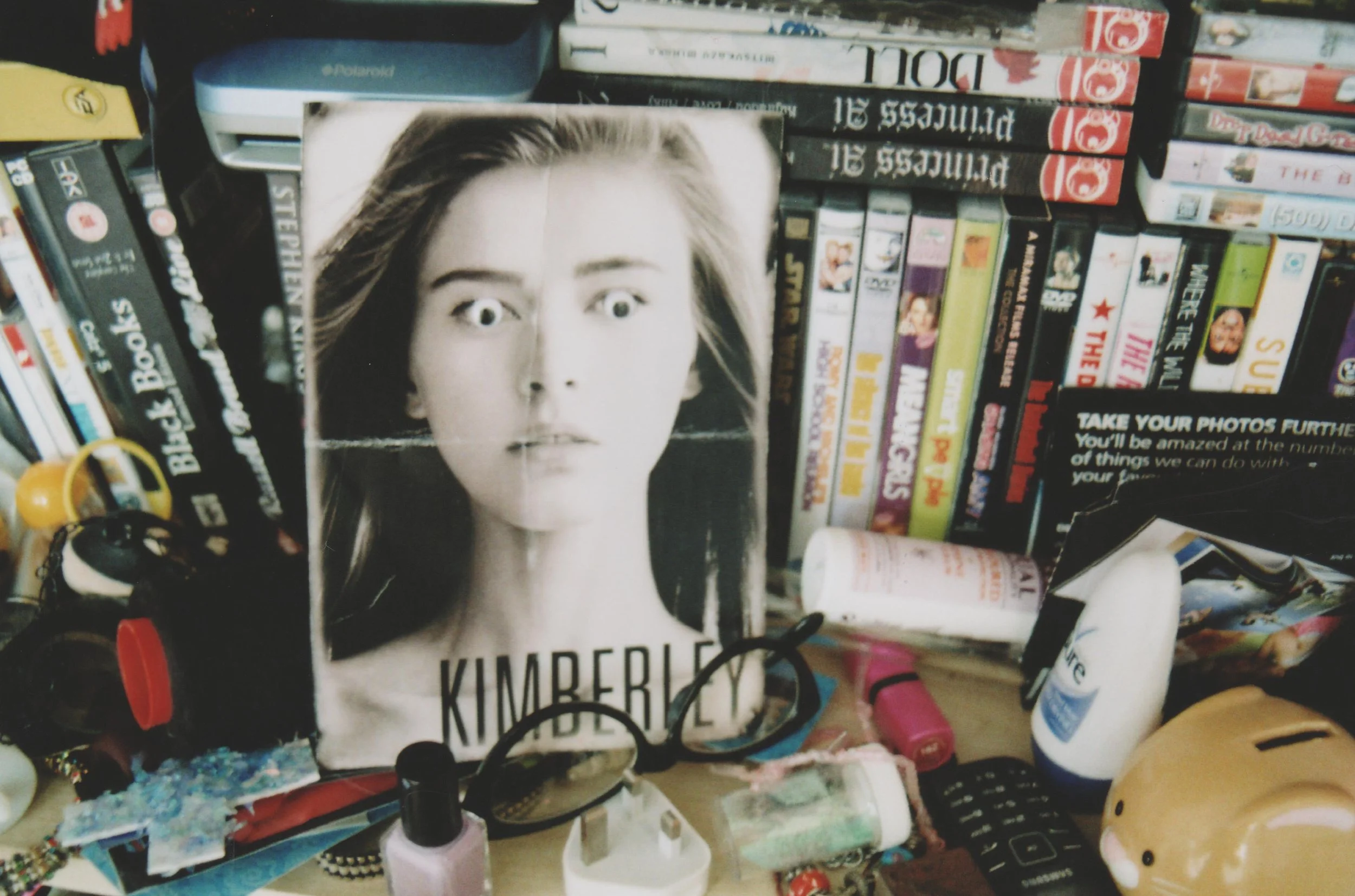 2010s-girls-bedroom-detail-dvds-teenage-room-35mm-film-photography.jpg.jpg
