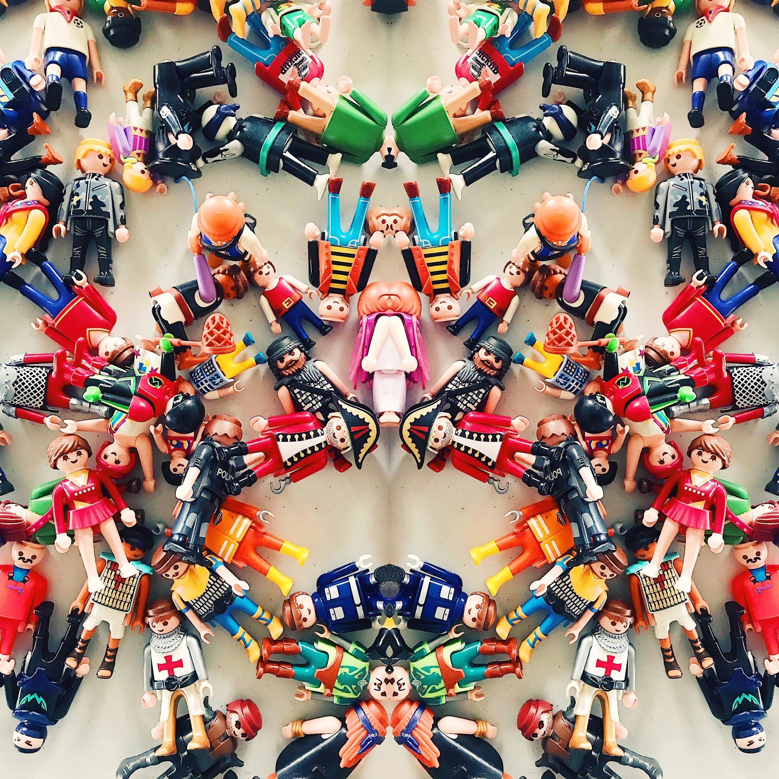 playmobil-figurines-symmetrical-pattern-colourful-toy-arrangement.jpg.JPEG