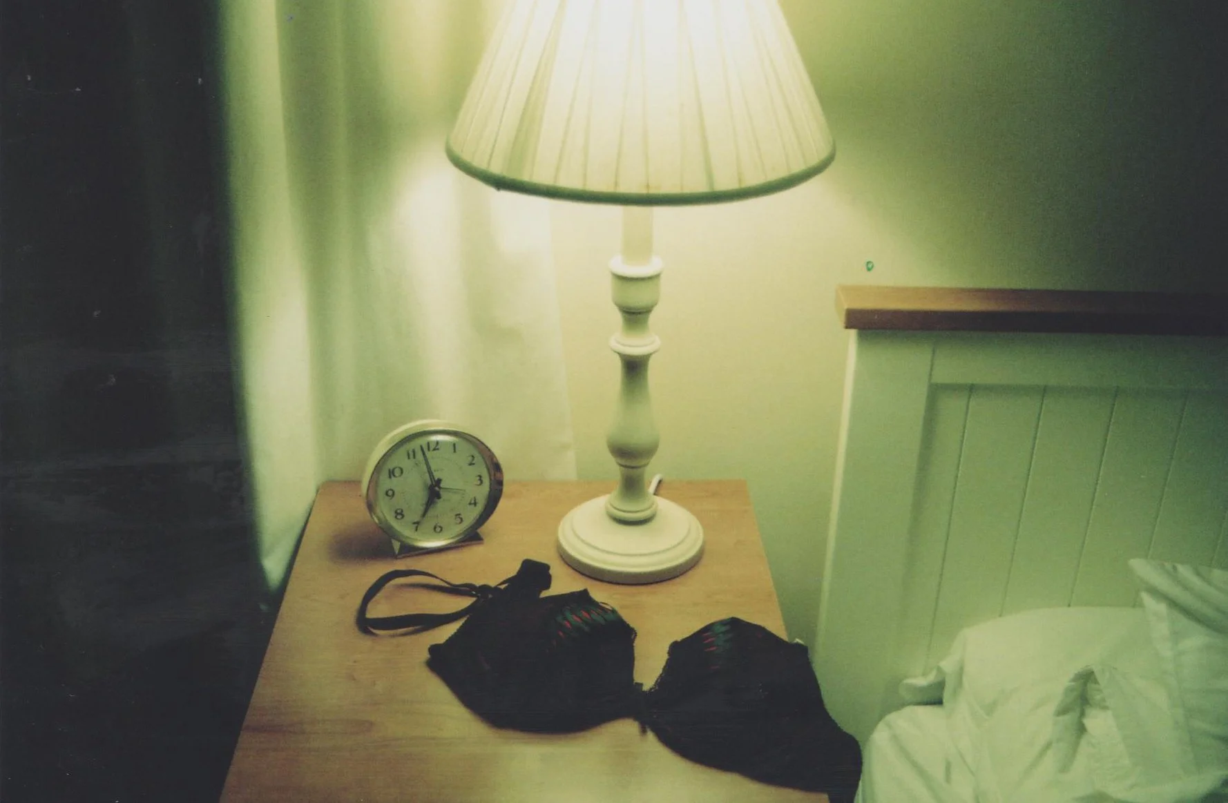 bedside-table-nighttime-scene-lamp-clock-lingerie-35mm-film.jpg.jpg