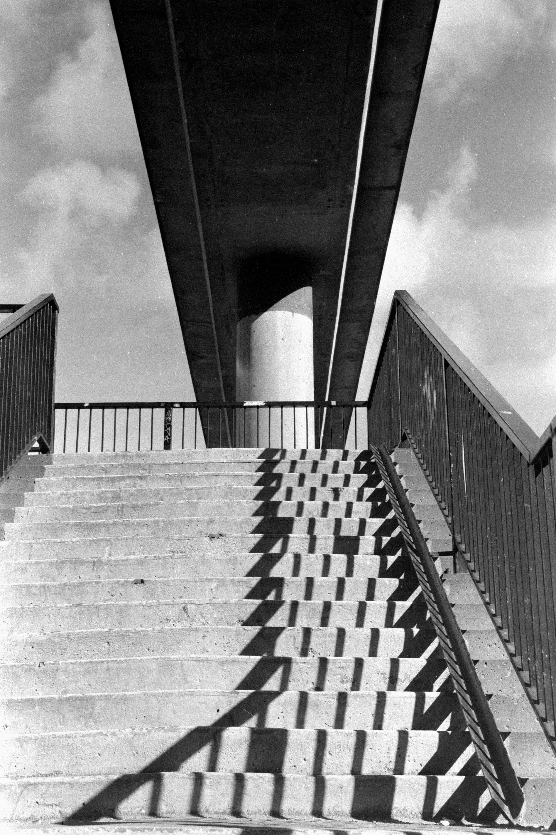 newcastle-manors-overpass-brutalist-concrete-staircase-shadow-black-and-white-35mm-film.jpg