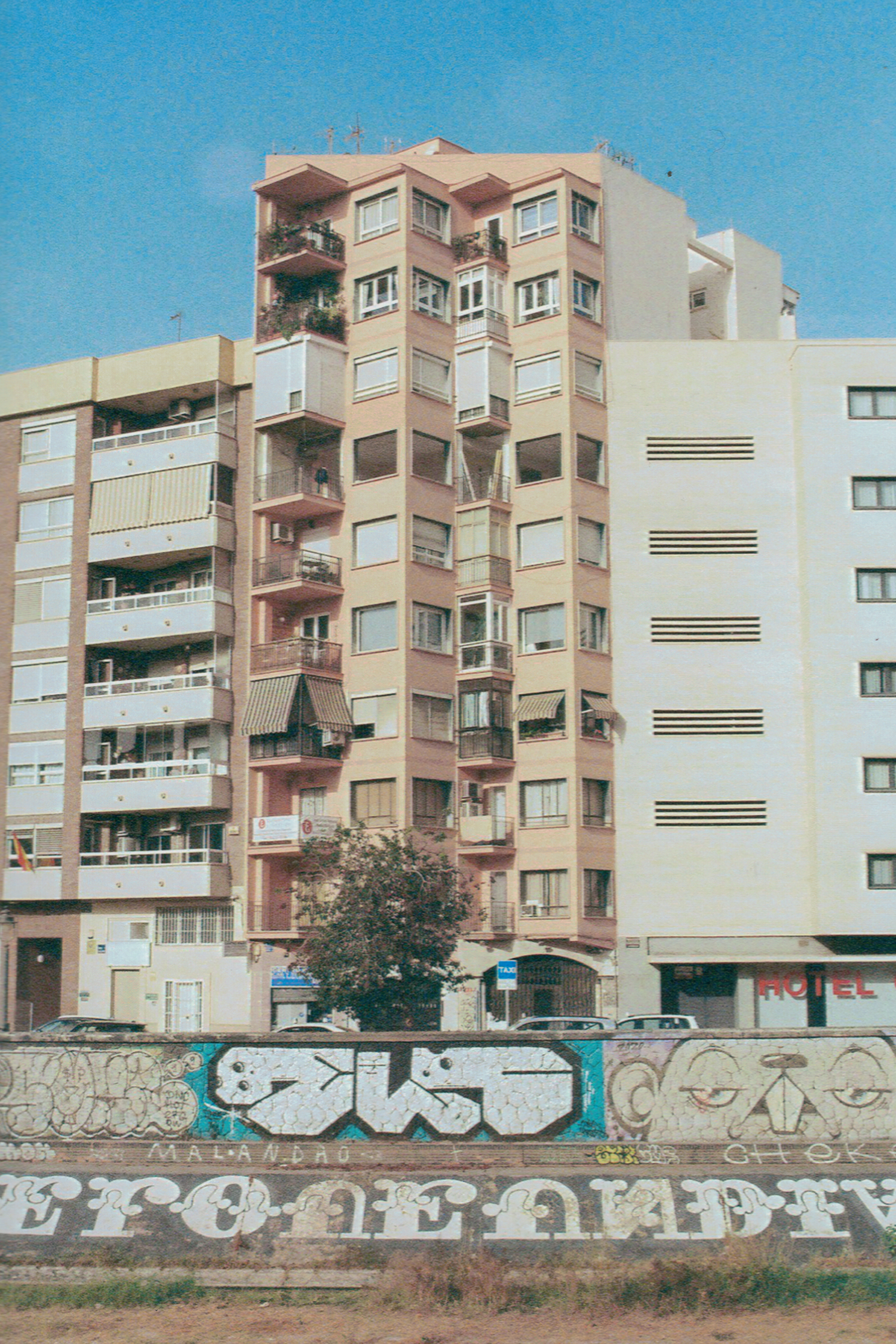 malaga-apartment-block-graffiti-wall-street-photography-35mm-film.png