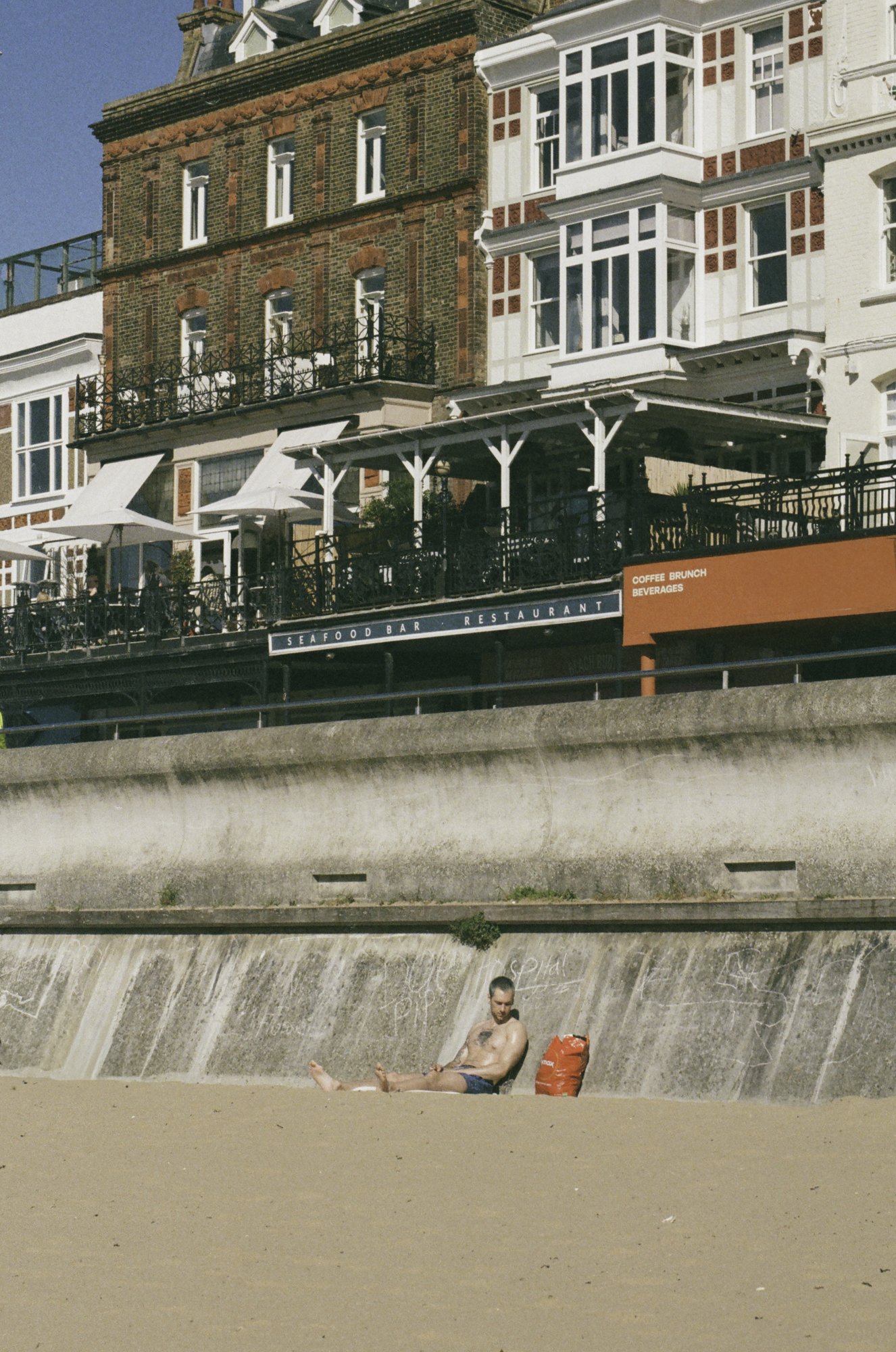 margate-beach-sunbather-seafront-seafood-bar-35mm-film.jpg