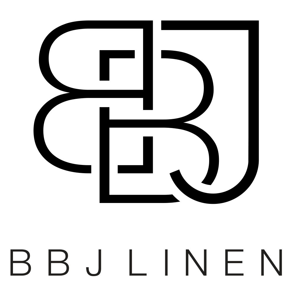 Logo with a stylized, interconnected monogram of the letters B, B, J, L, I, N, E, N in black, and the text 'BBJ LINEN' below.