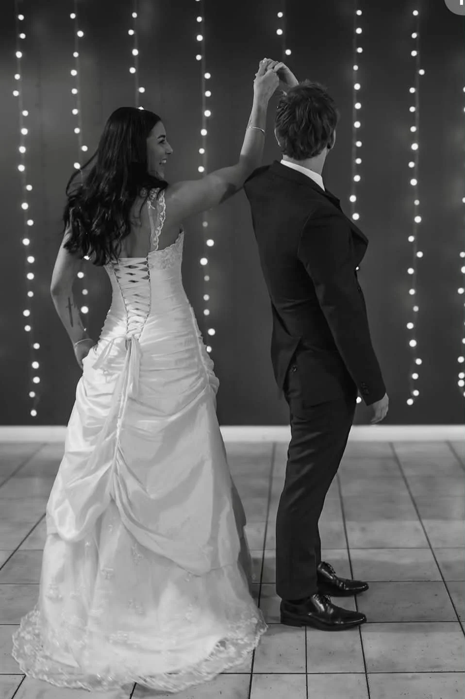 Happy couple dancing at wedding reception