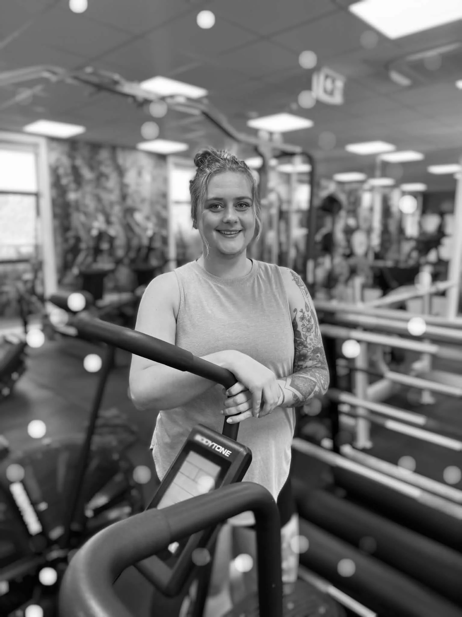 Jess, bride to be, standing in gym