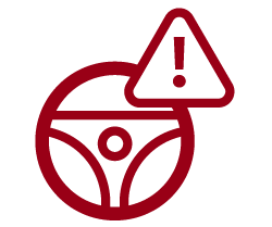 A red outline-style icon: Warning sign with a steering wheel and exclamation mark.