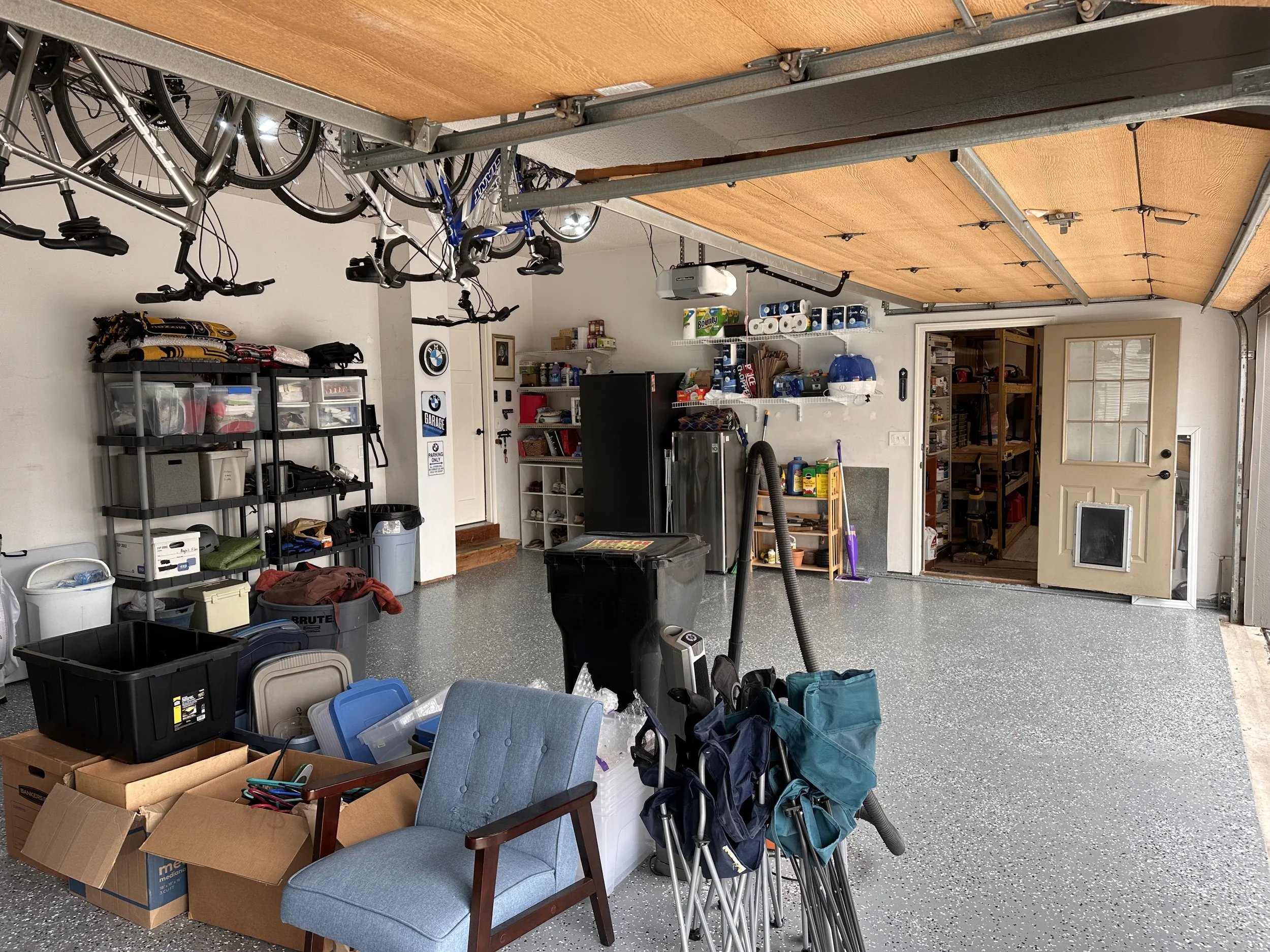 3 Car Garage with door leading to the Workshop