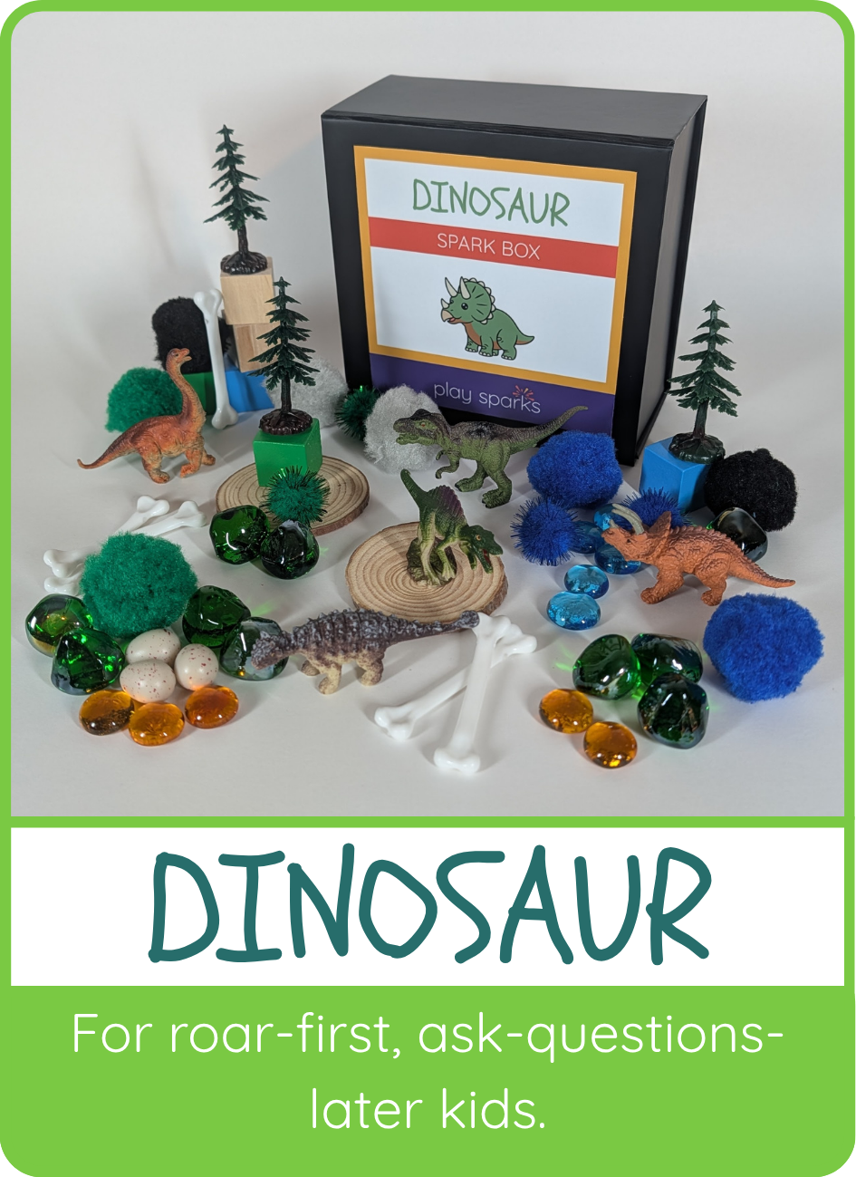 Dinosaur Spark Box for roar-first, ask-questions-later kids, shown with dinosaurs, bones, eggs, and pine trees