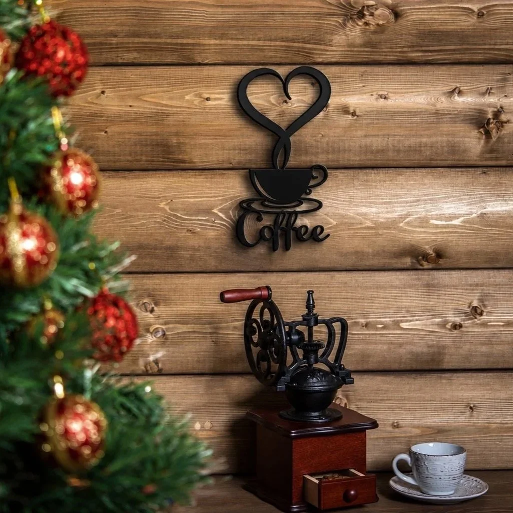 coffeecup wallart with heart shaped steam on a rustic wood wall with a christmas tree and antique coffee grinder