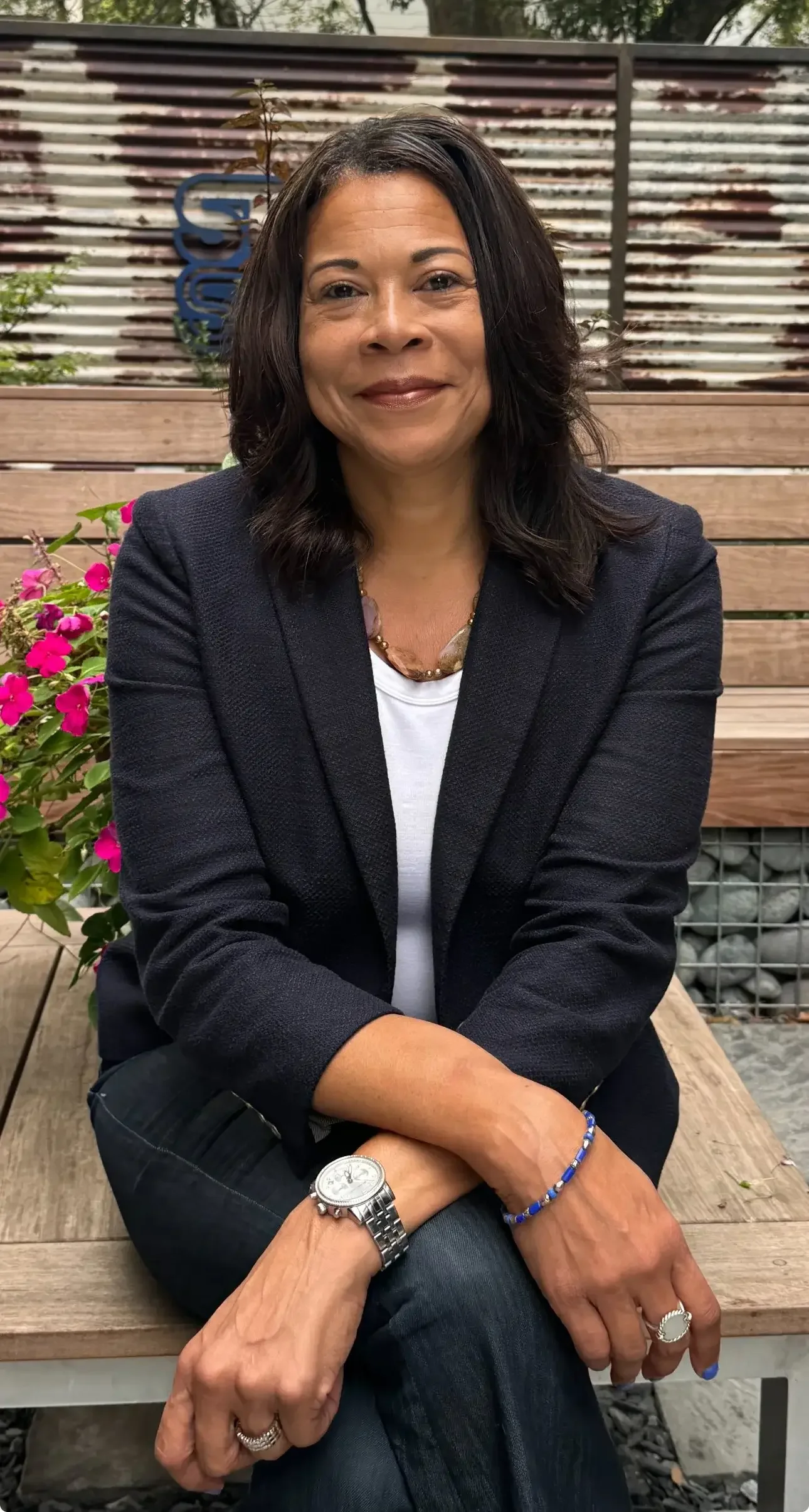 Colleagues collaborating in a bright office, discussing ideas, taking notes, and engaging in teamwork to solve business challenges.