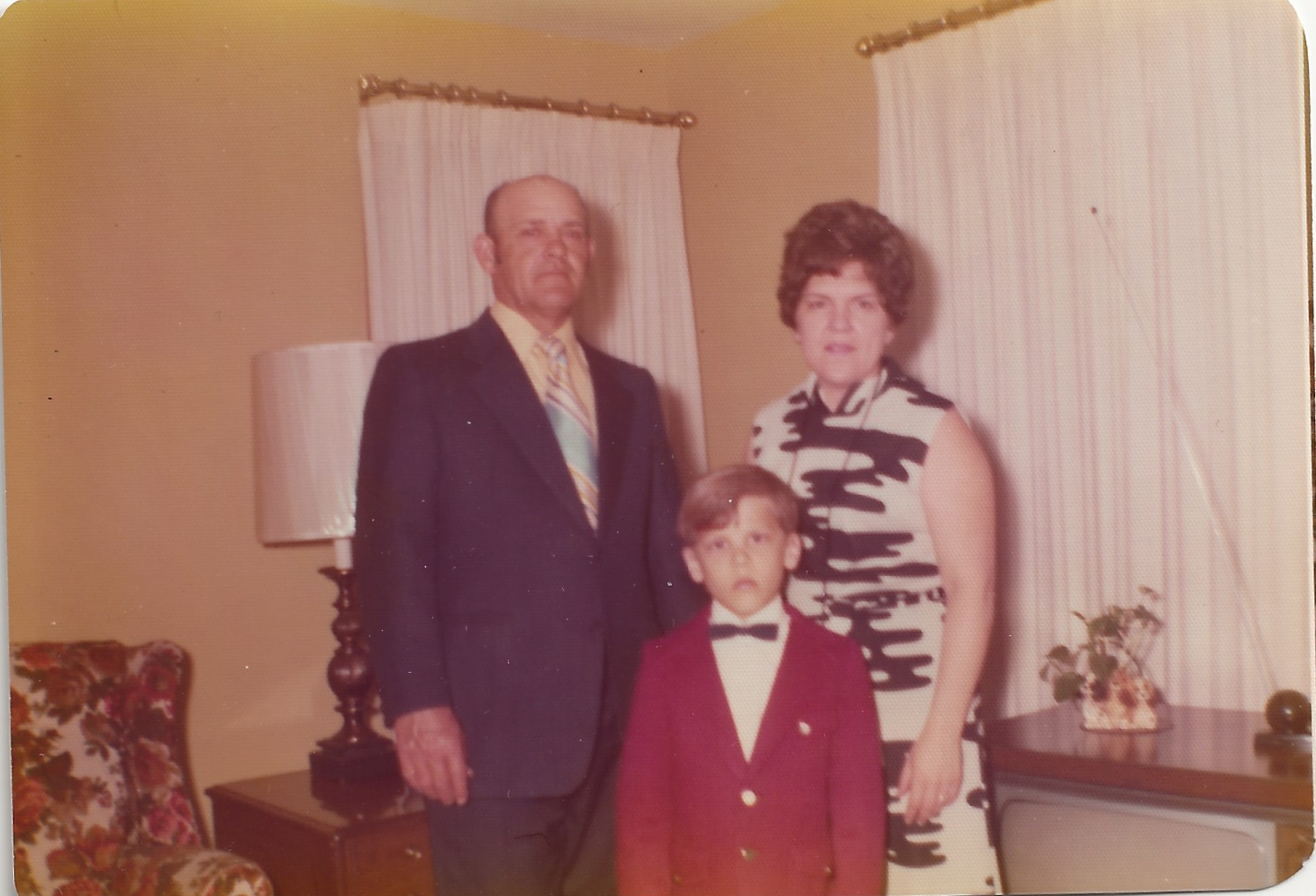 Frank and Rita with Matthew First Communion.png
