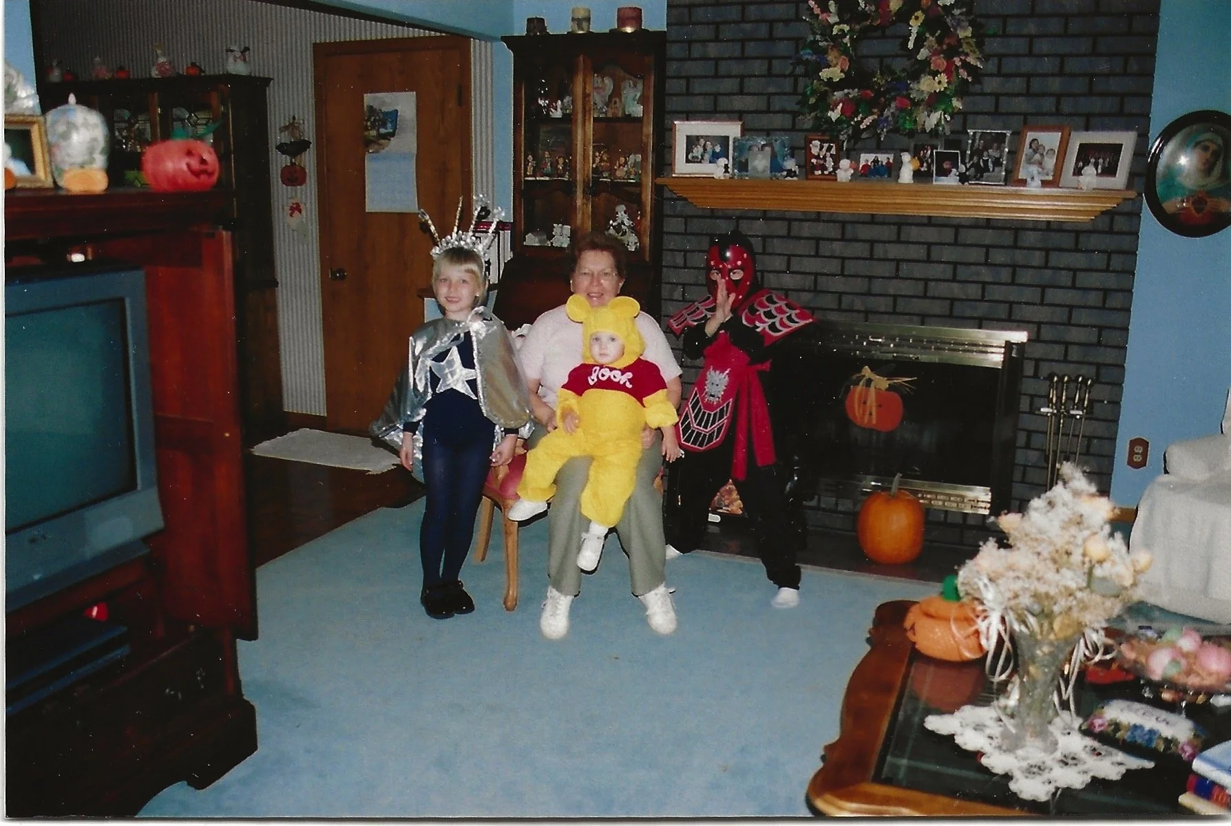 Dennis, Kelsie, & Hailey with Rita in their Halloween Costumes